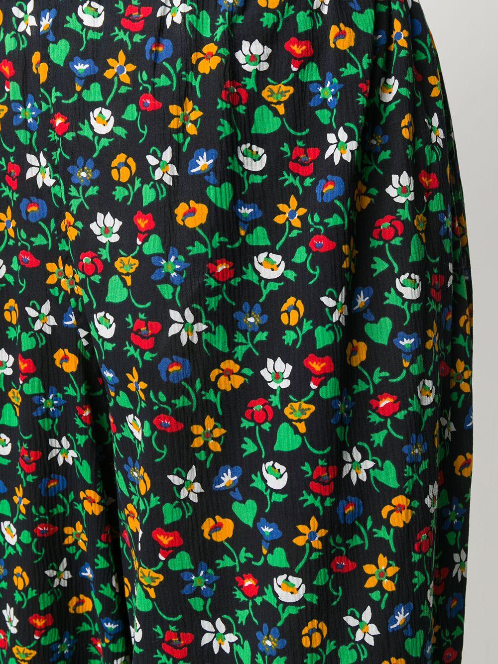  1977s Saint Laurent Rive Gauche, Collection Printemps-Eté 1977 cotton sarouel featuring a mid length,  floral print, an elasticated waistband, elasticated bottoms legs.  
In good vintage condition. 
Made in France. 
Estimated size 36fr/ US4/ UK8
We