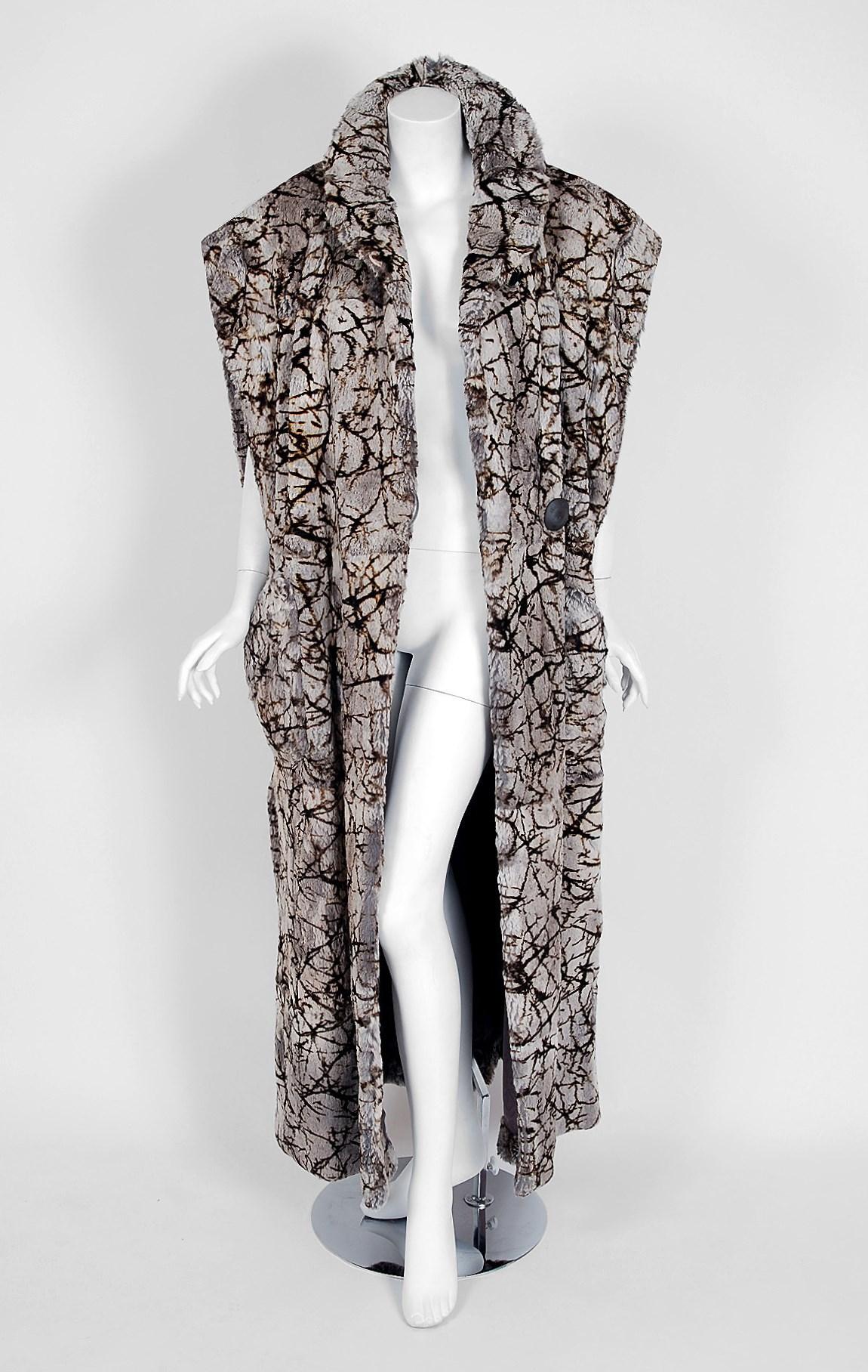 Breathtaking Fendi Couture genuine chinchilla-fur vest which retailed for over $15,000. This piece is SO chic! In the mid 1960's Fendi hired designer Karl Lagerfeld and this proved to be a highly successful union. The direction of the company