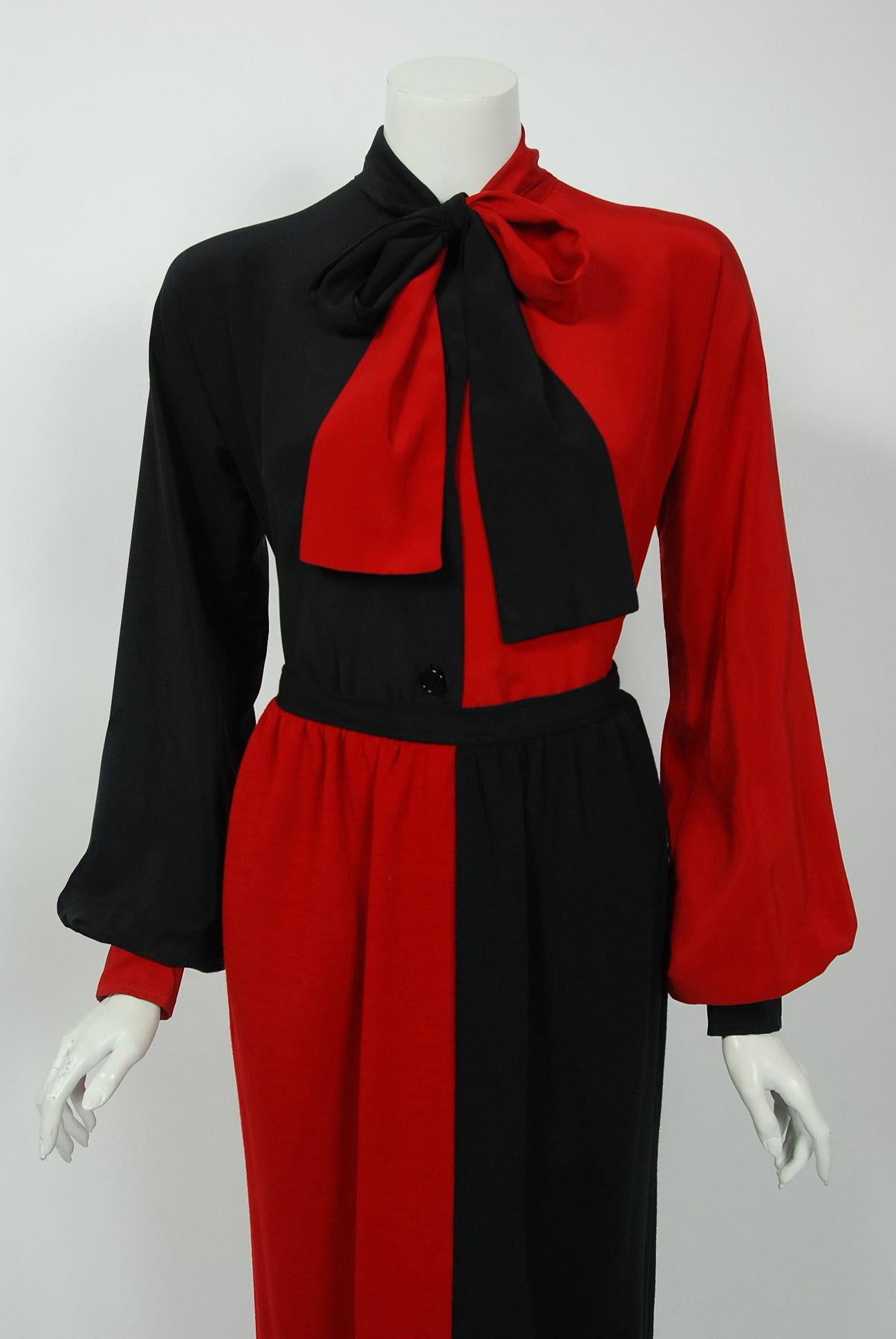 A gorgeous Givenchy Nouvelle Boutique black and red block-color ensemble dating back to their 1978 collection. Givenchy, the name itself evokes glamour, refined elegance, simplicity and style. Givenchy's trademark of sculpted lines and luxurious