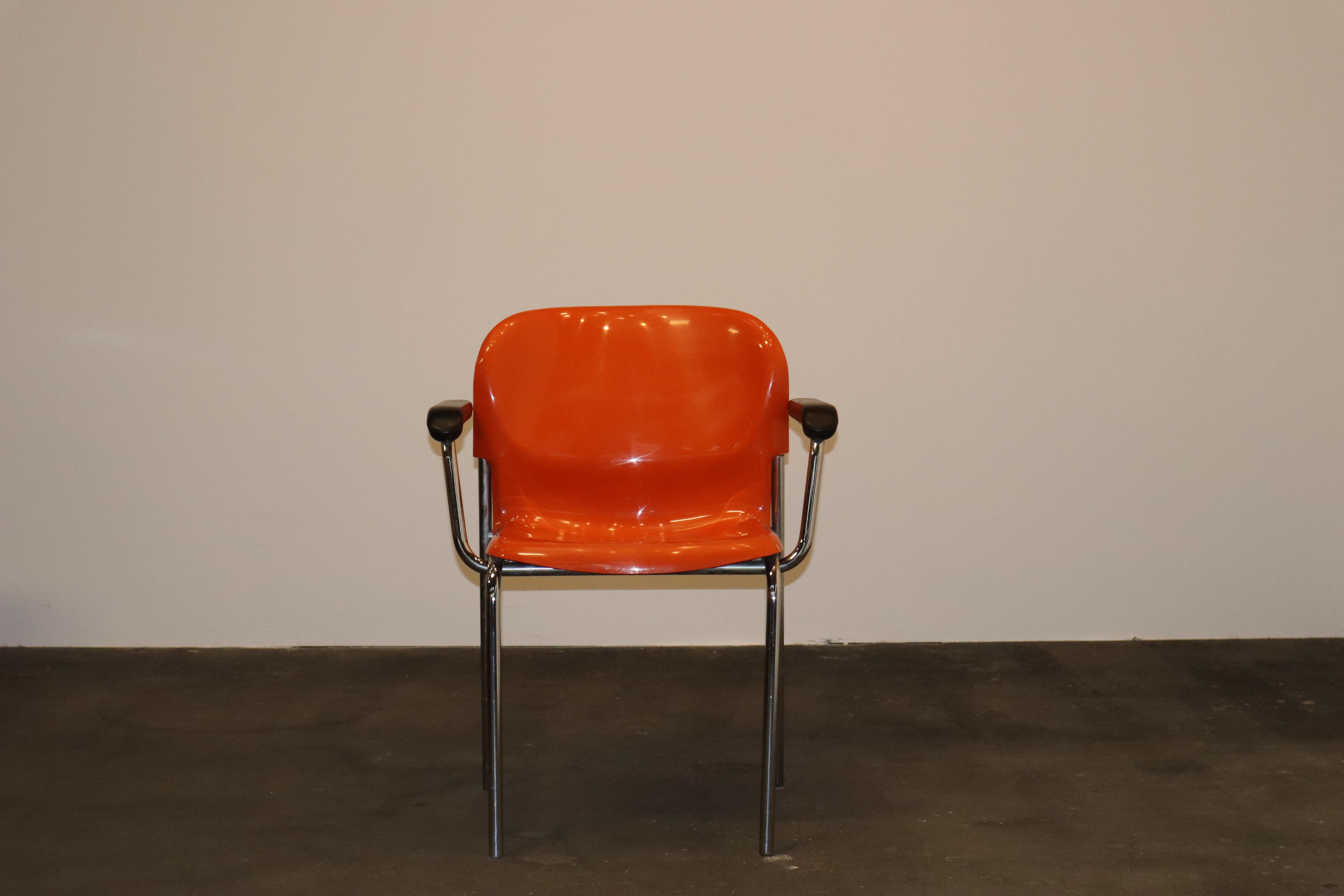 Model Swing SM400K armchair in orange molded plastic and chromed tube steel designed by Gerd Lange for Drabert, Germany, 1978.
 