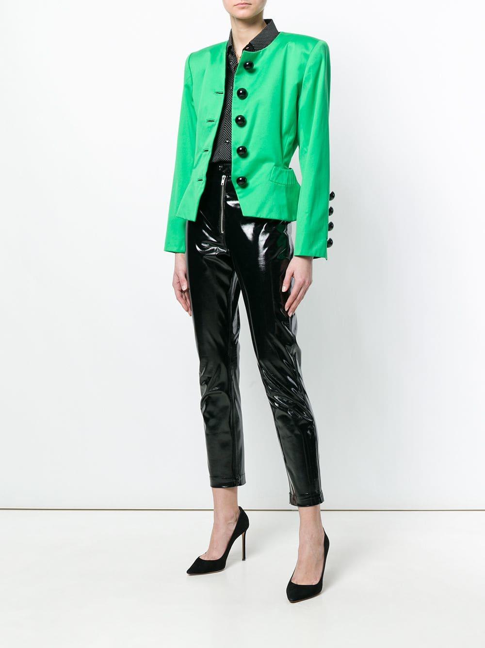 Yves Saint Laurent eye-catching bright pea green silk and cotton crewneck slim fit jacket, with long sleeves, black plastic oversized buttons front fastening and buttoned cuffs. Two curved design welt pockets. Lined in green fabric, with black edges