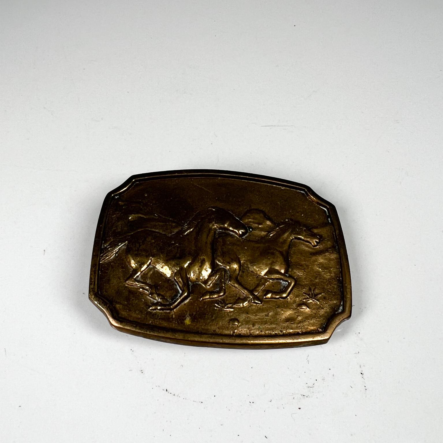 1979 BTS solid brass vintage belt Buckle Horses
3.13 x 2.25 X .23
Vintage buckle belt. Made USA
Stamped on the back with makers info.
Vintage wear present. Preowned vintage condition.
See images.



