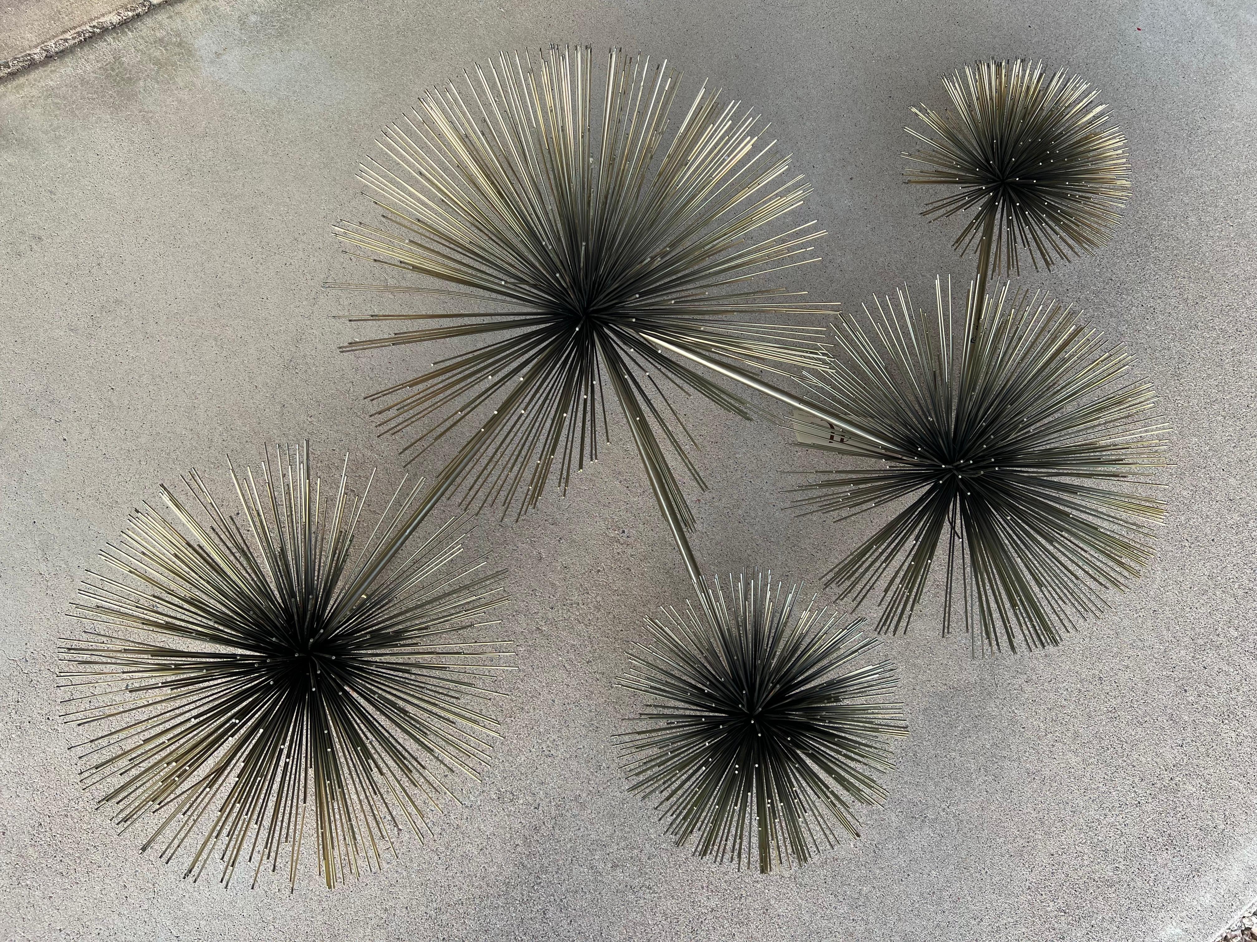 1979 C. Jeré or Curtis Jere Artisan House brass metal wall sculpture. Signed and dated with original paper tag. It’s often referred to as the pom pom or urchin design. According to the tag, the correct name is dandelion. 42” wide x 28” tall x 11”