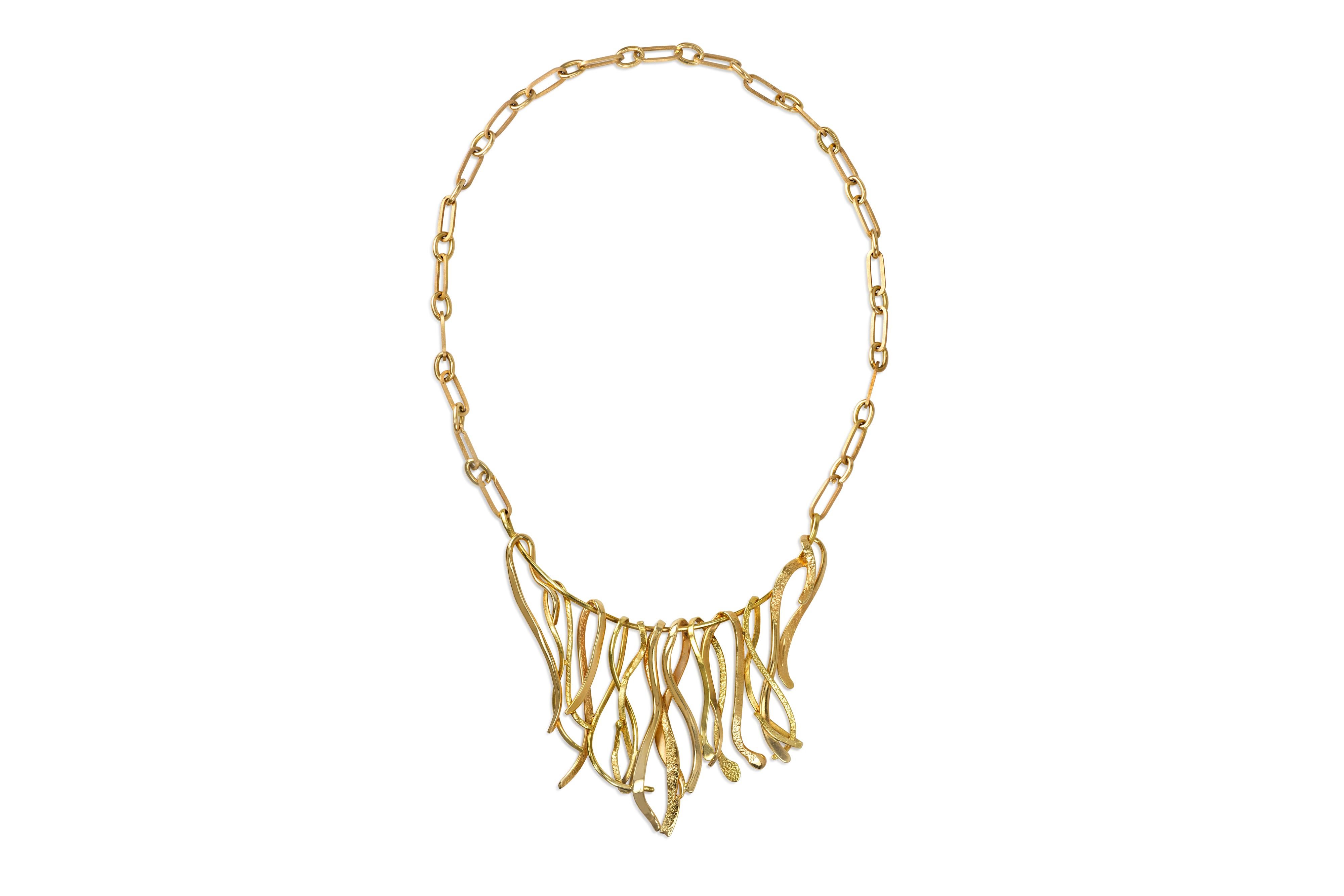 An 18 karat gold bib necklace, by the Swedish master goldsmith, Elon Arenhill, 1979. The necklace measures 19
