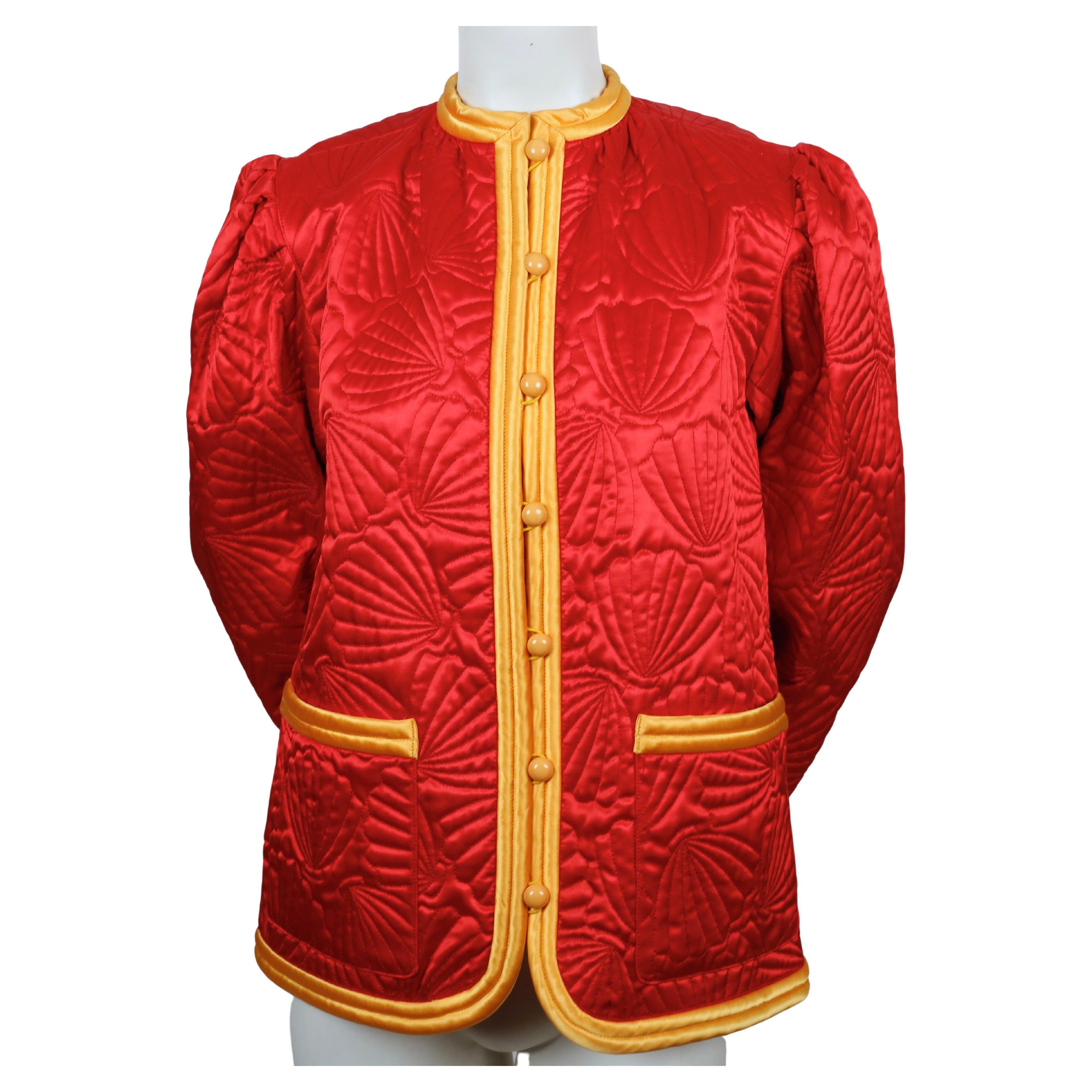 Very rare, quilted, red-satin jacket with seashell embroidery and yellow trim designed by Yves Saint Laurent as seen on the spring 1979 runway. FR 38. Approximate measurements: shoulder 15