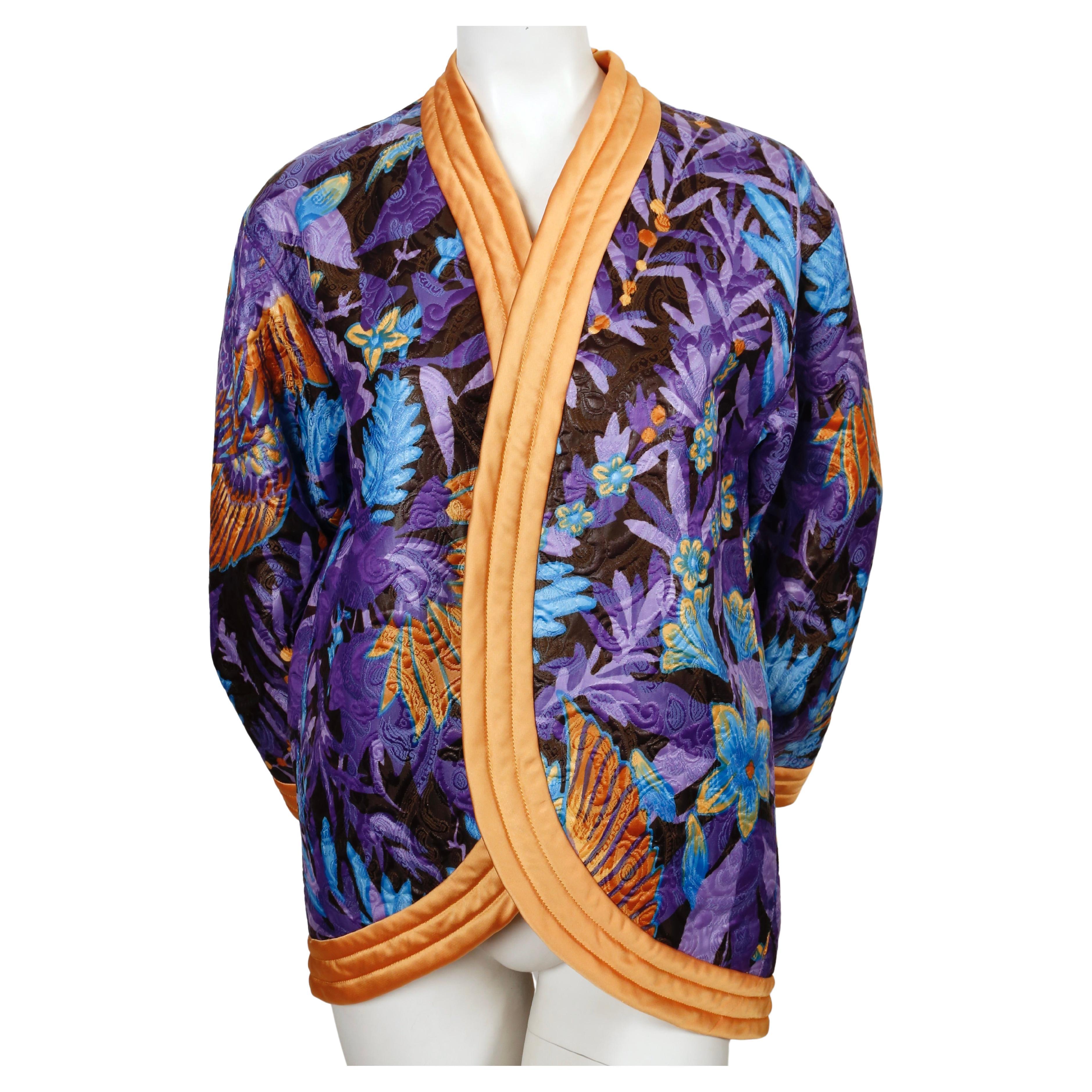 Satin kimono jacket with matelasse Asian phoenix motif designed by Yves Saint Laurent dating to 1979 exactly as seen on the runway. Labeled a French 40 however this can fit a variety of sizes due to the loose cut. Jacket was not clipped on size 2