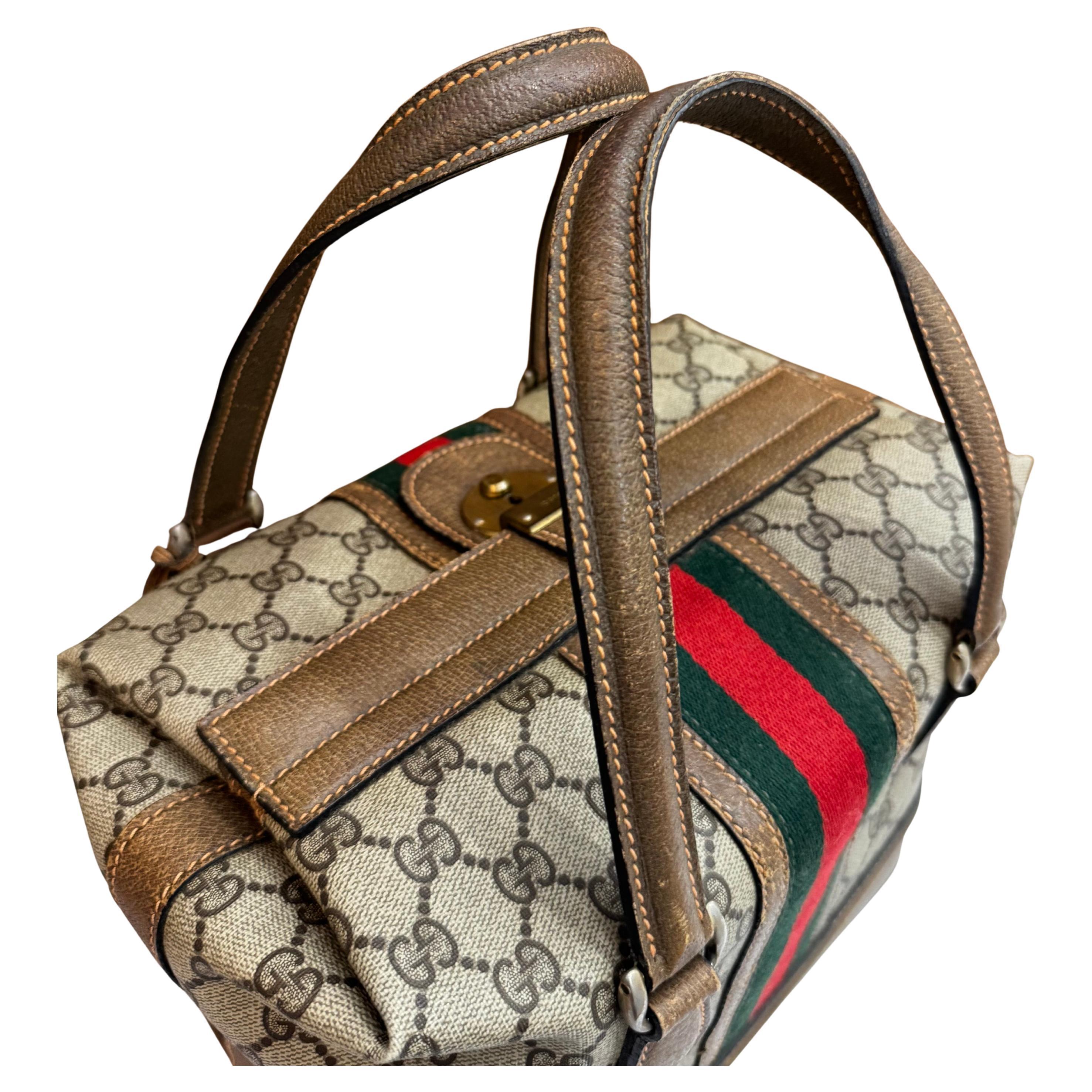 Women's or Men's 1979s  Vintage GUCCI Web Monogram Canvas Vanity Hand Bag Brown Small For Sale