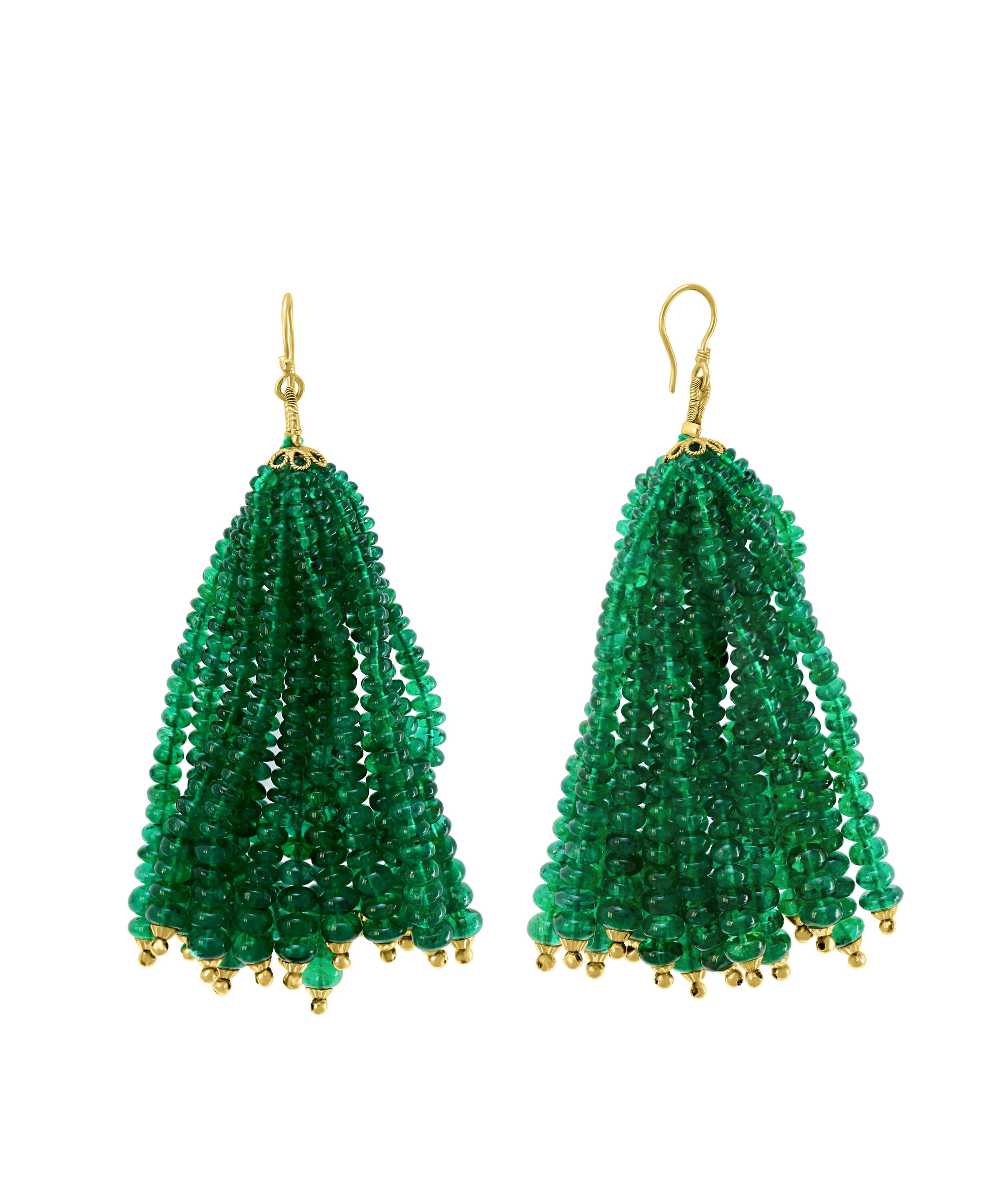 
198 Carats Emerald Beads   Hanging Earrings  18 Karat Gold.
This exquisite pair of earrings are beautifully crafted with 18 karat yellow gold  
This pair of Earrings has 198 carats of Emerald beads . Finest color and quality.
Hard to match so many