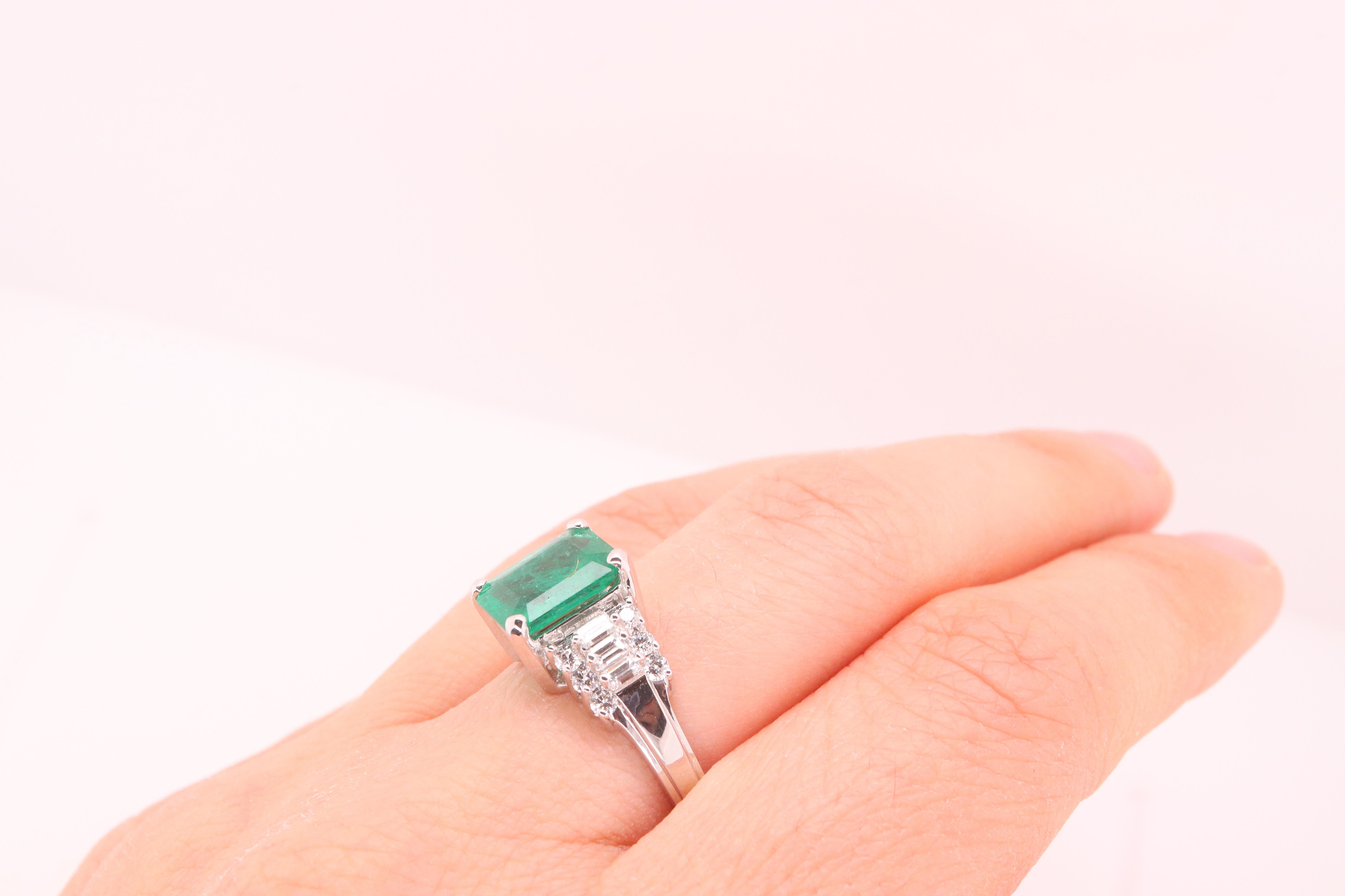 Contemporary 1.98 Carat Natural Emerald and Baguette White Diamond Ring 18K White Gold