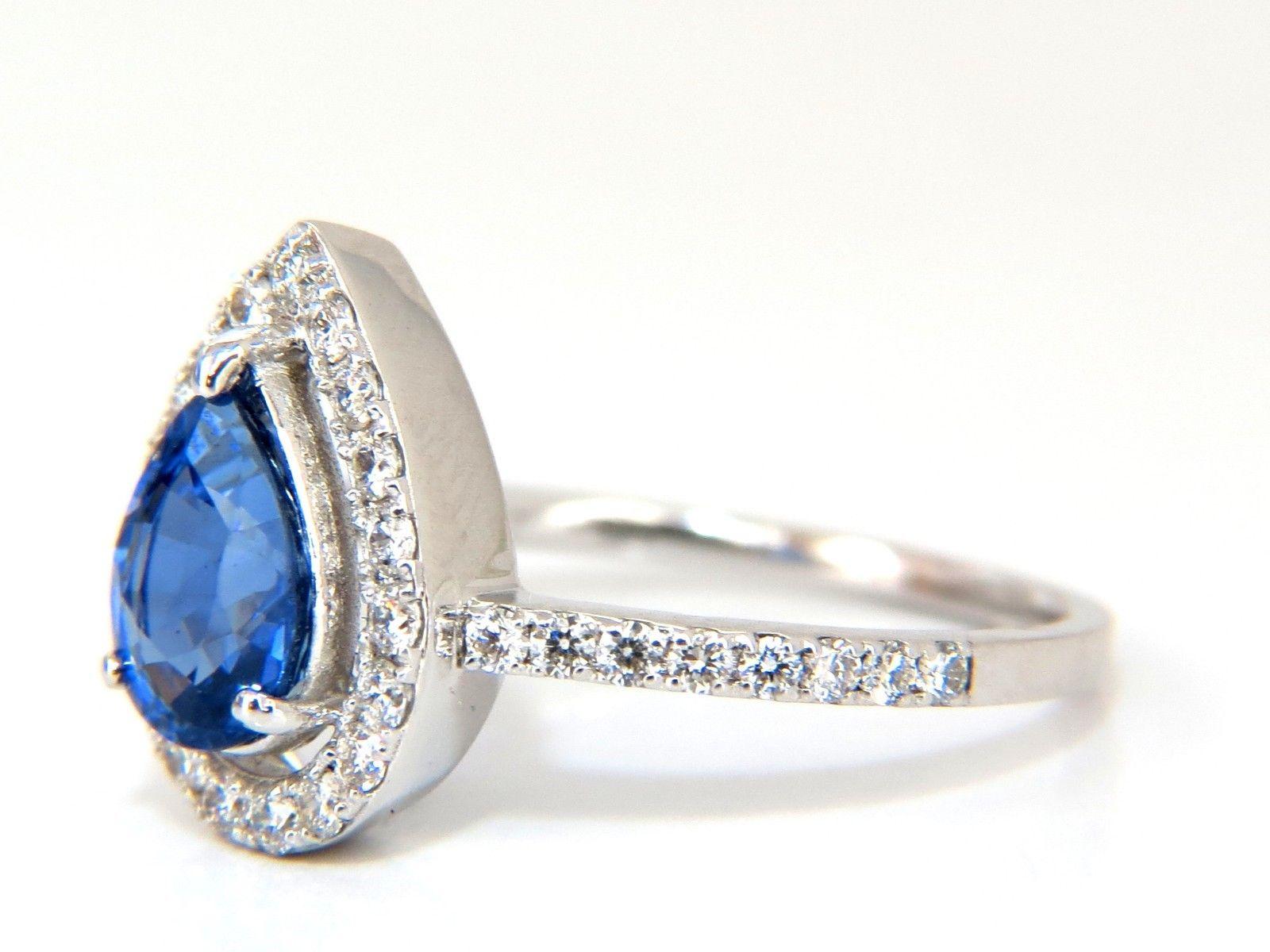 pear sapphire halo ring