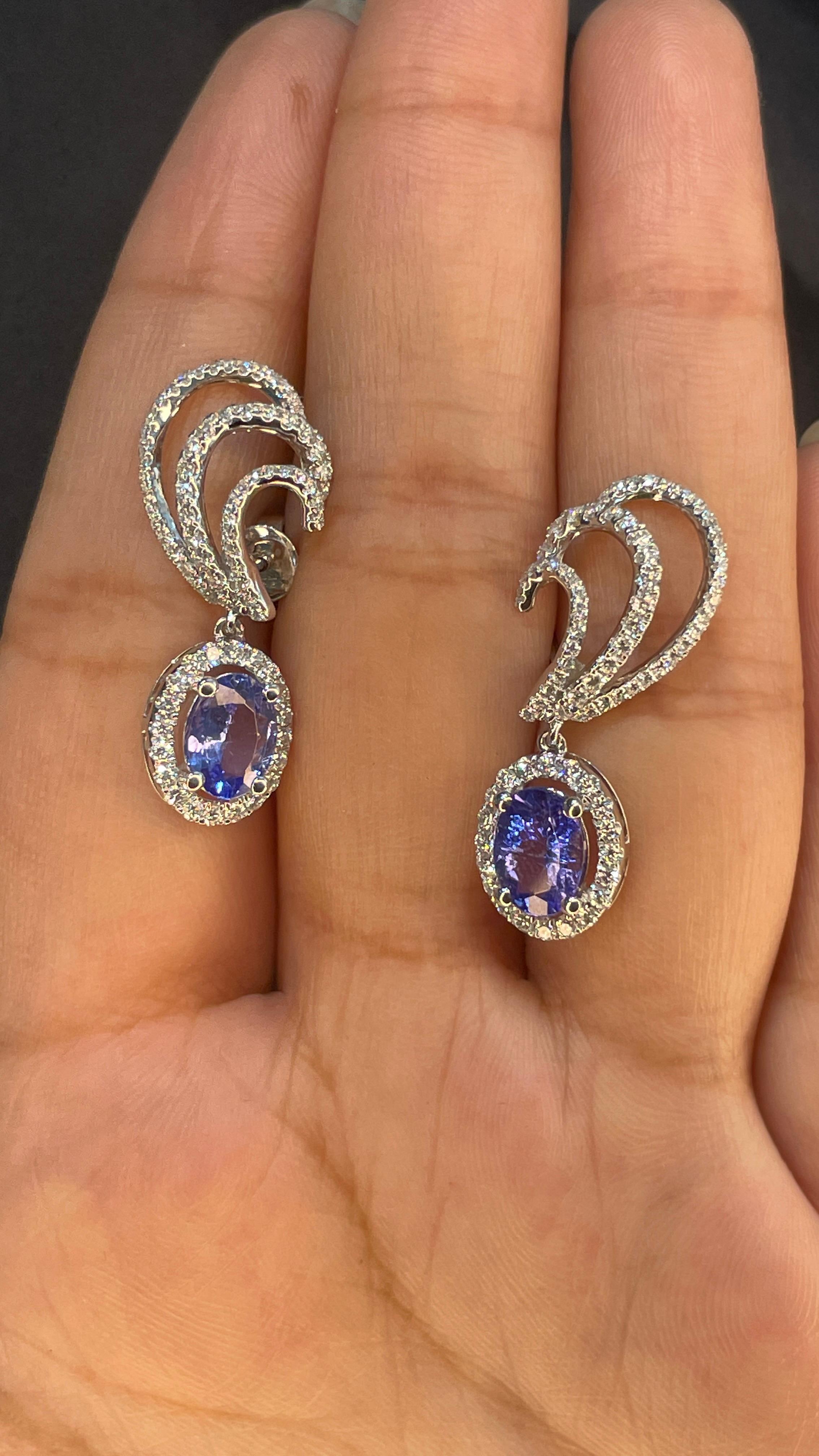 Oval Cut 1.98 Carat Tanzanite and Diamond Designer Stud Earrings in 14K White Gold For Sale