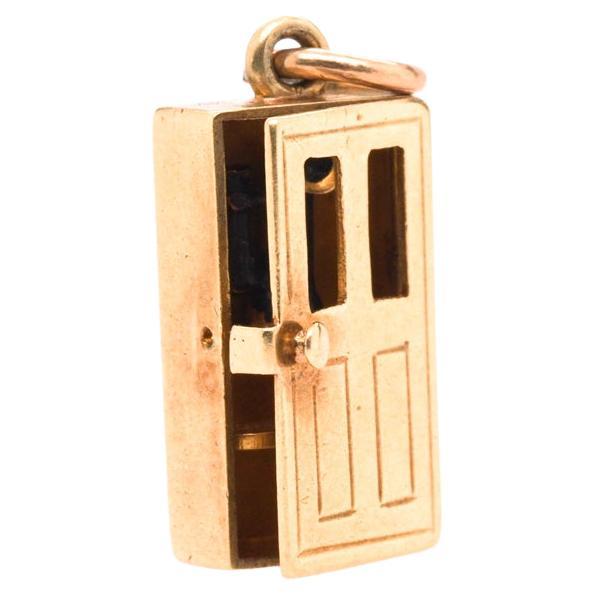 1980 14K Yellow Gold Door Pendant Locket with Trumpet Inside For Sale