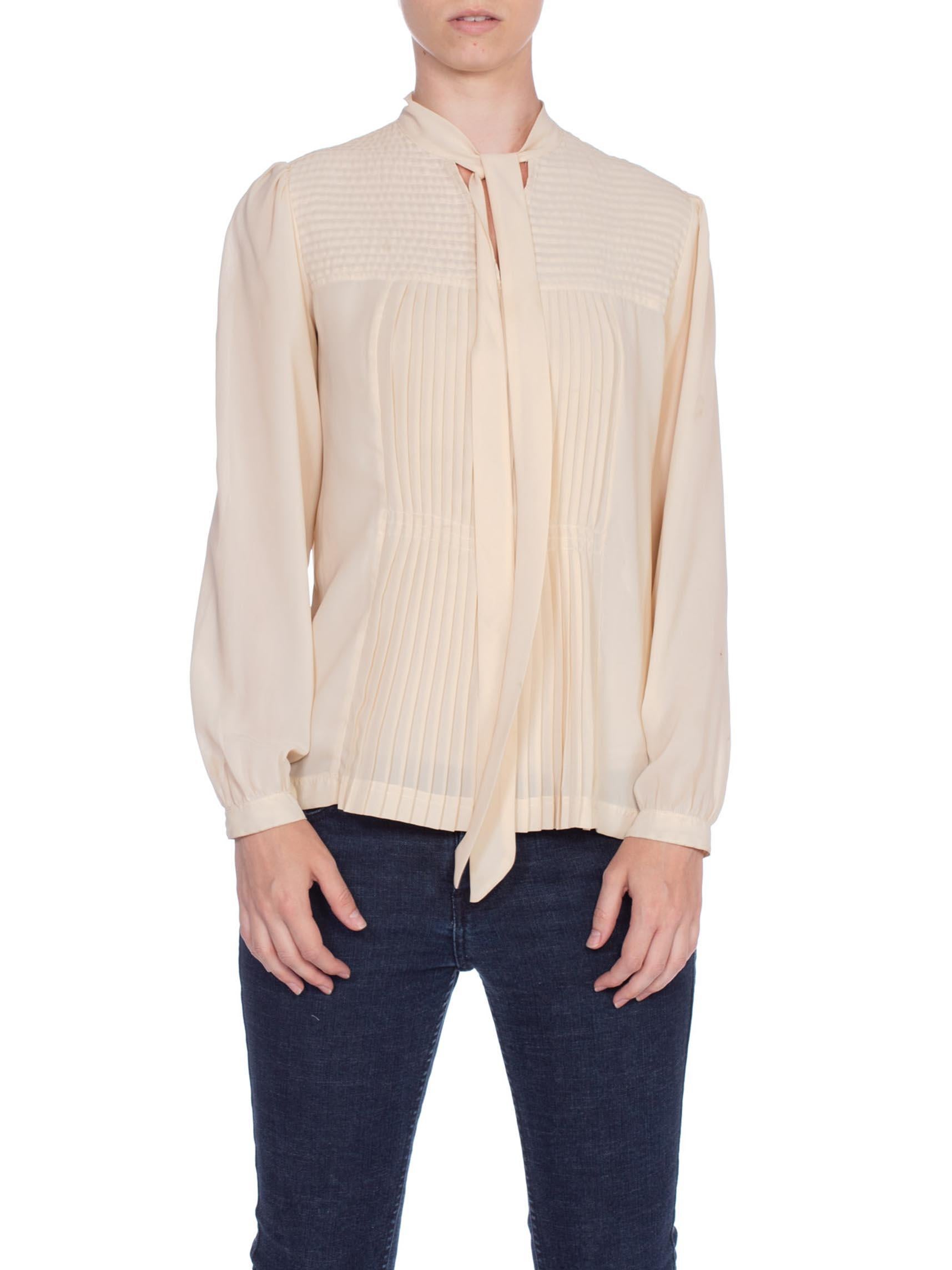 pleated blouse with bow