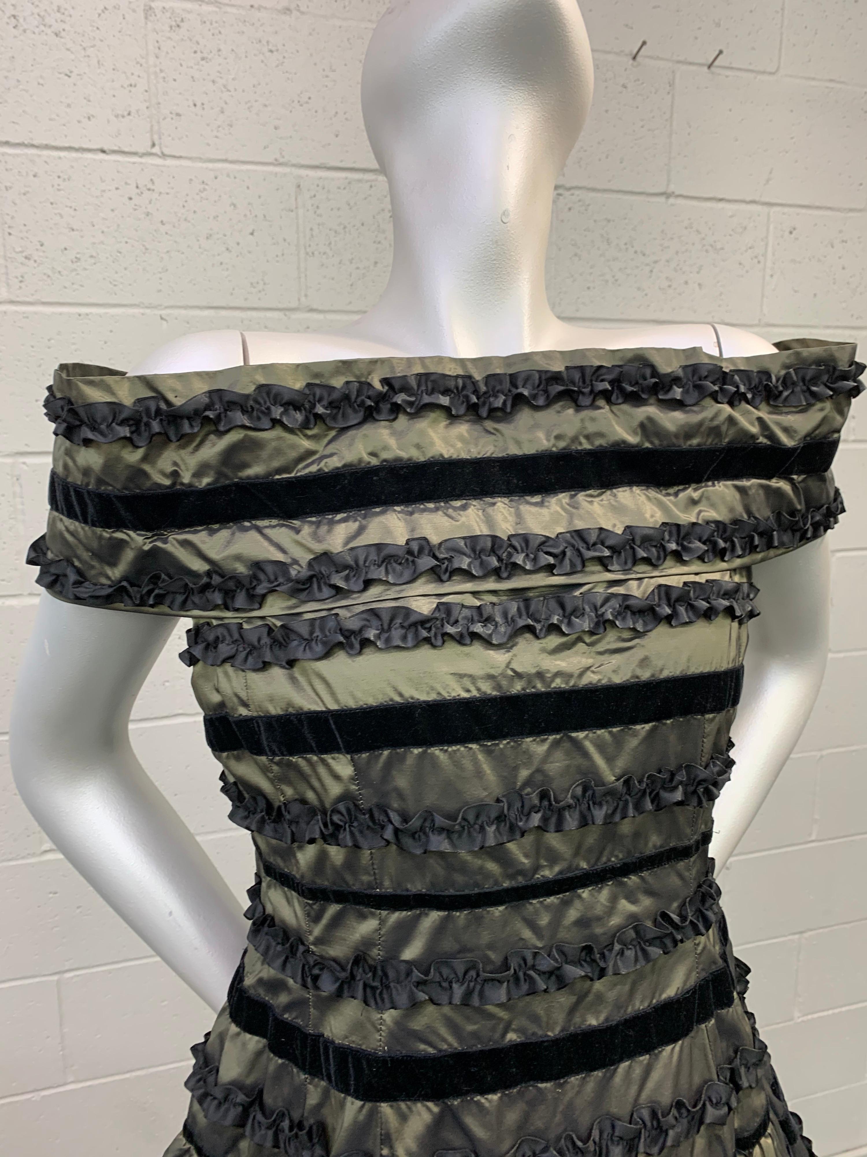 1980s Arnold Scaasi off-the-shoulder cocktail dress with black velvet and ruffled horizontal stripes. Silk changeant taffeta in olive/slate palette. Stand-up bandeau décolletage and bell-shaped skirt. Fully lined double layered skirt with horsehair