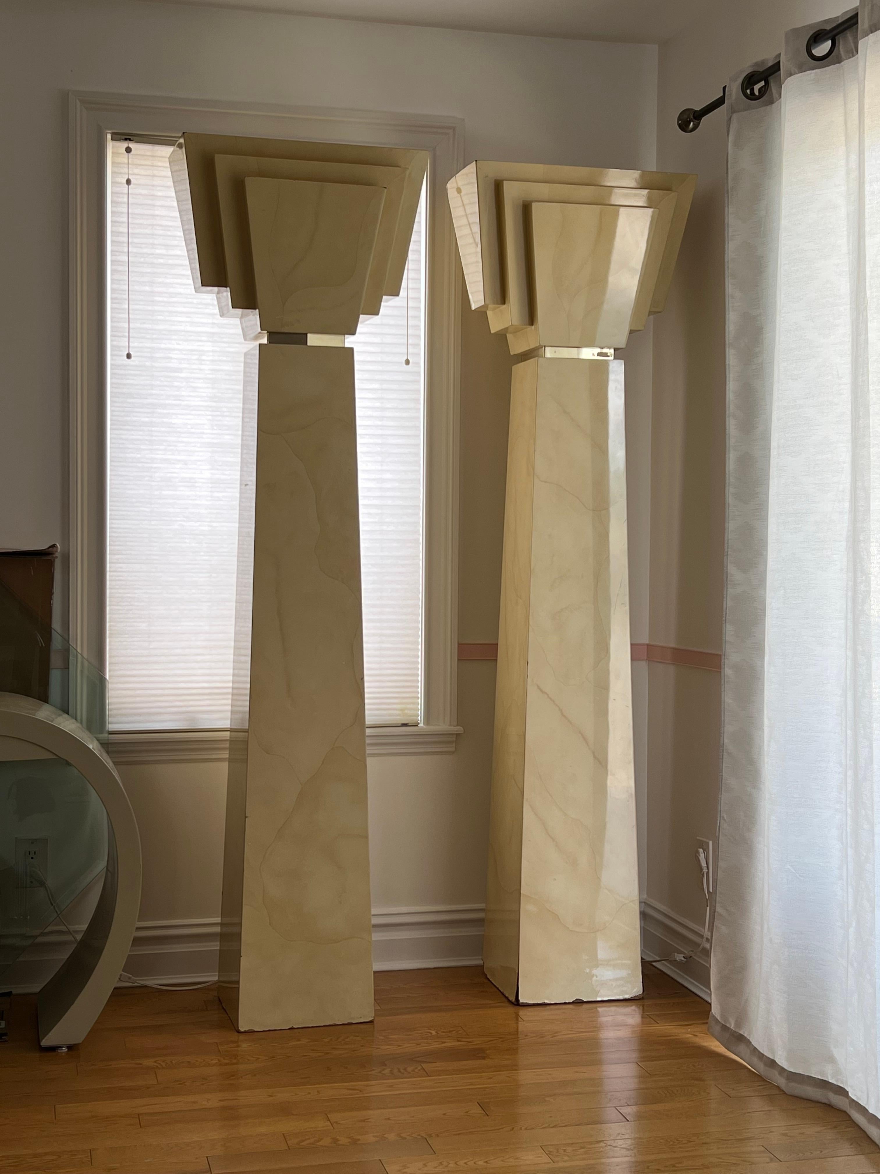 Rare set of Art Deco wall column floor lamps covered with goatskin lacquer, in the style of Karl Springer.

The lamps are very heavy, solid pieces perfect for any rooms. On the bottom of the lamps have normal wears, please check all of the photos