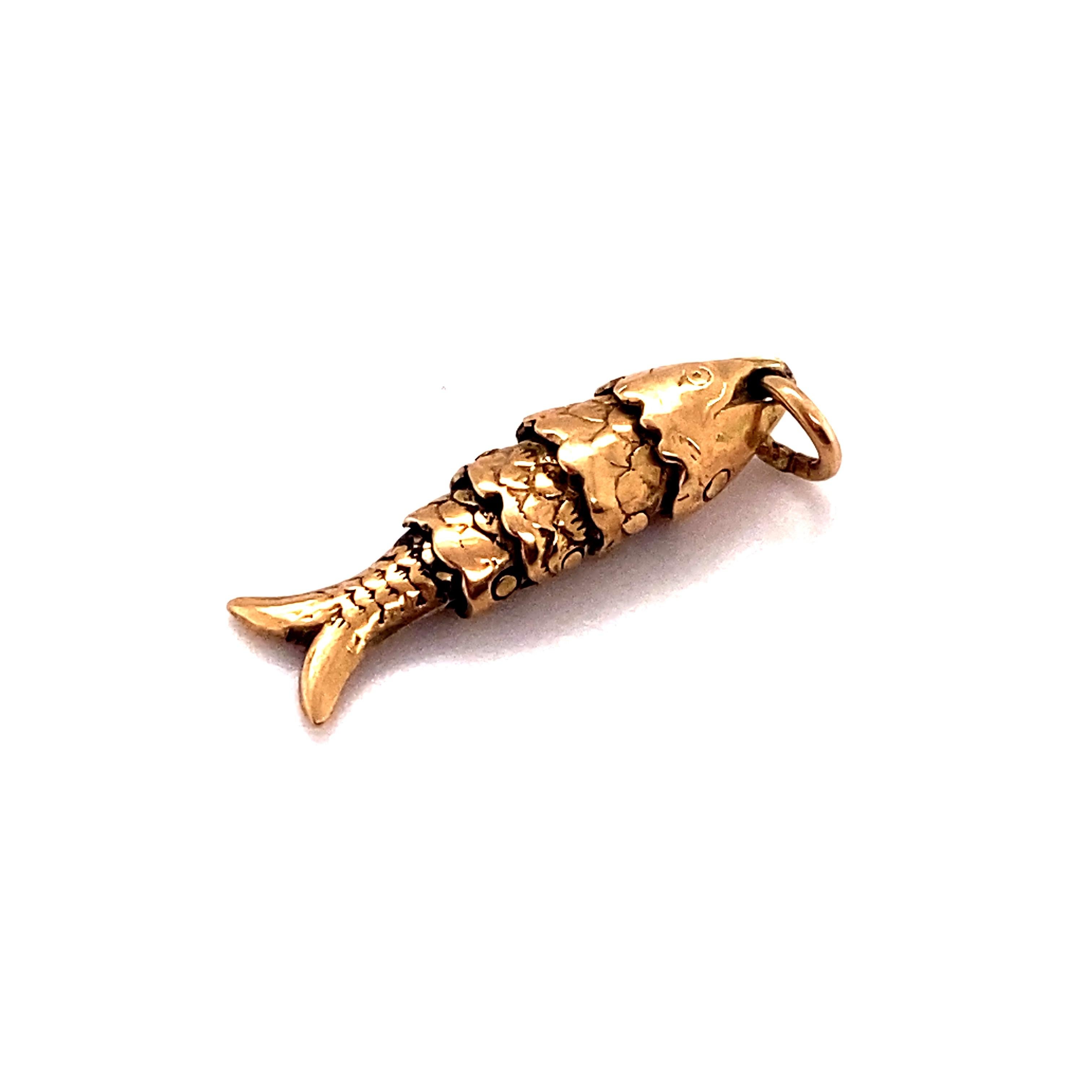 articulated fish pendant