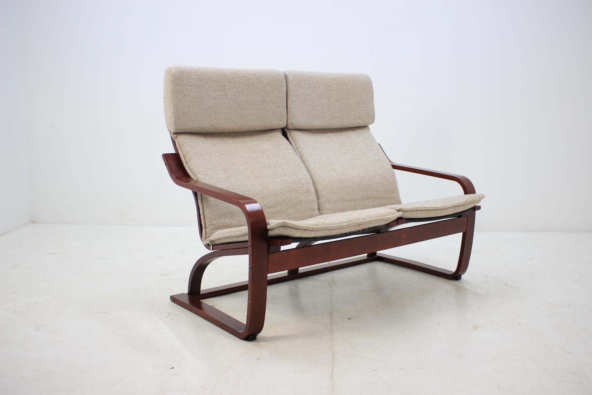 Produced by Ton, Czechoslovakia in late 1980s. The frame is made from beech bentwood. The original cushions and the item are in good original condition.