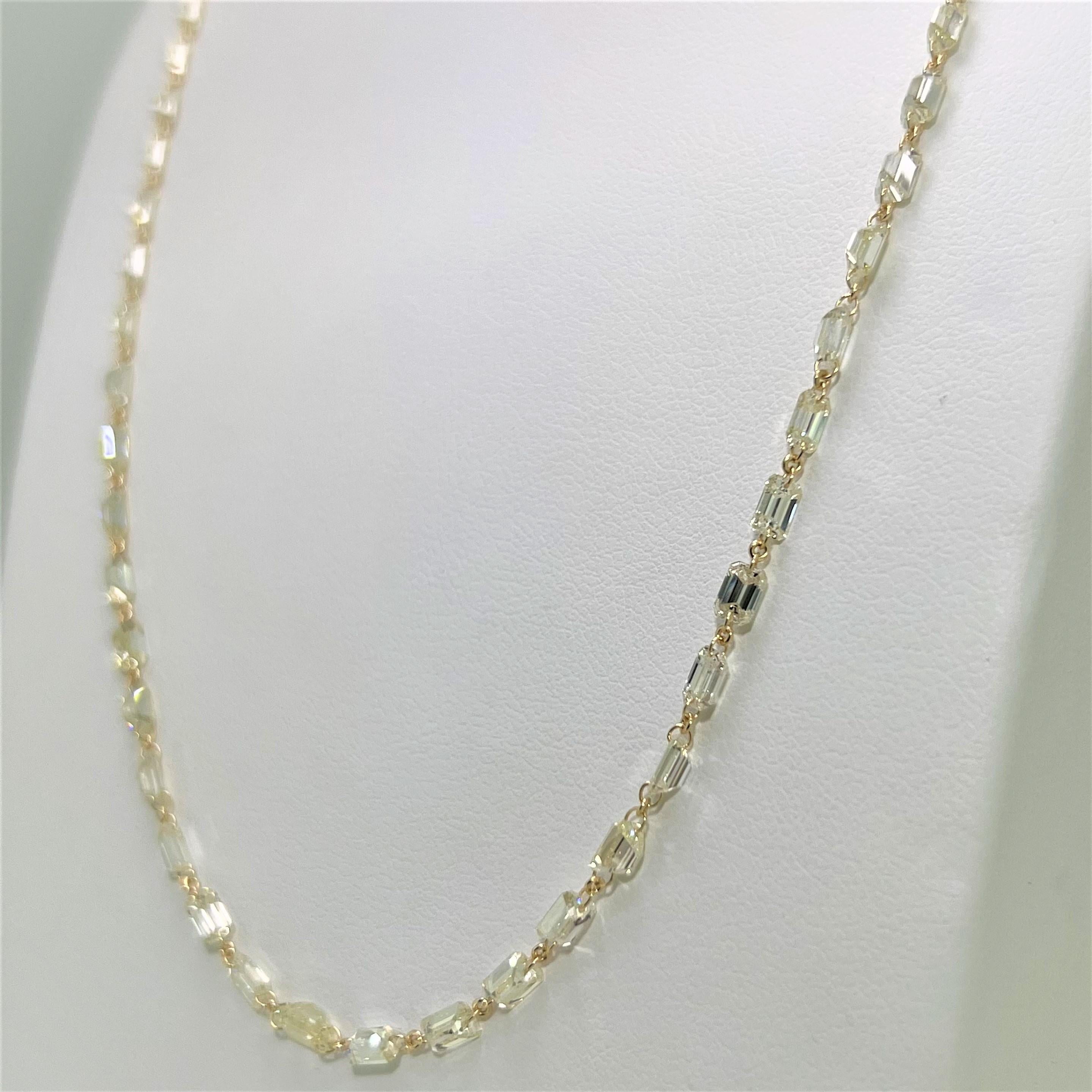 This is a timeless piece Yellow Diamond Necklace that has the ability to compliment anything you wear.  Embellished with 116 pieces of Tapas shaped Yellow Diamonds set on 18 Karat Yellow Gold, weighing 19.80 carats in total.  It displays gorgeous
