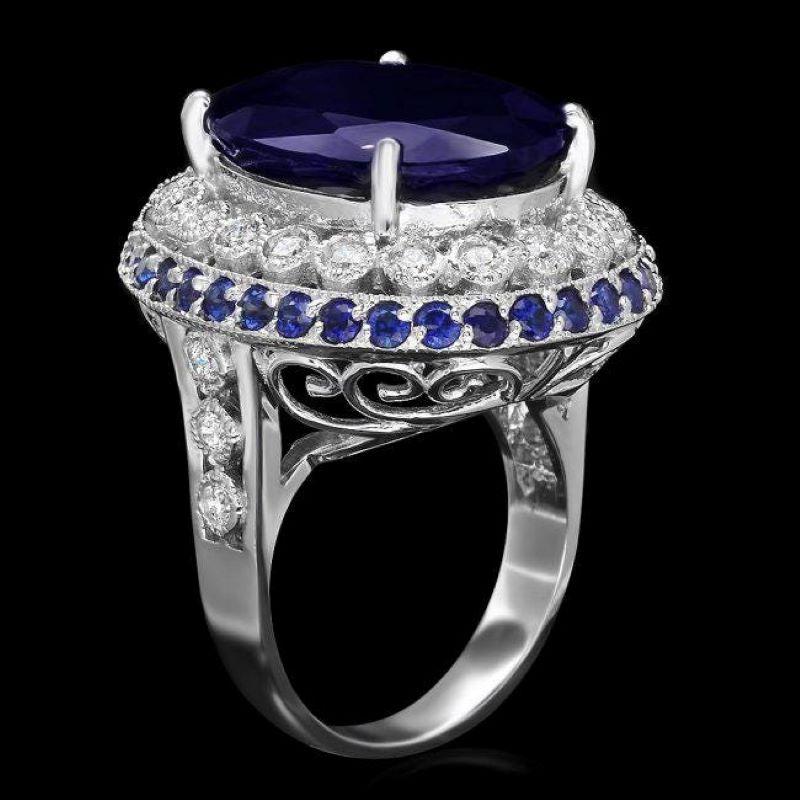 19.80 Carats Natural Sapphire and Diamond 14K Solid White Gold Ring

Total Natural Sapphire Weights: Approx. 19.00 Carats 

Sapphire Measures: Approx. 17.00 x 15.00mm (1 Oval)

Sapphire Measures: Approx. 2.00 mm (34 Round)

Sapphire treatment: