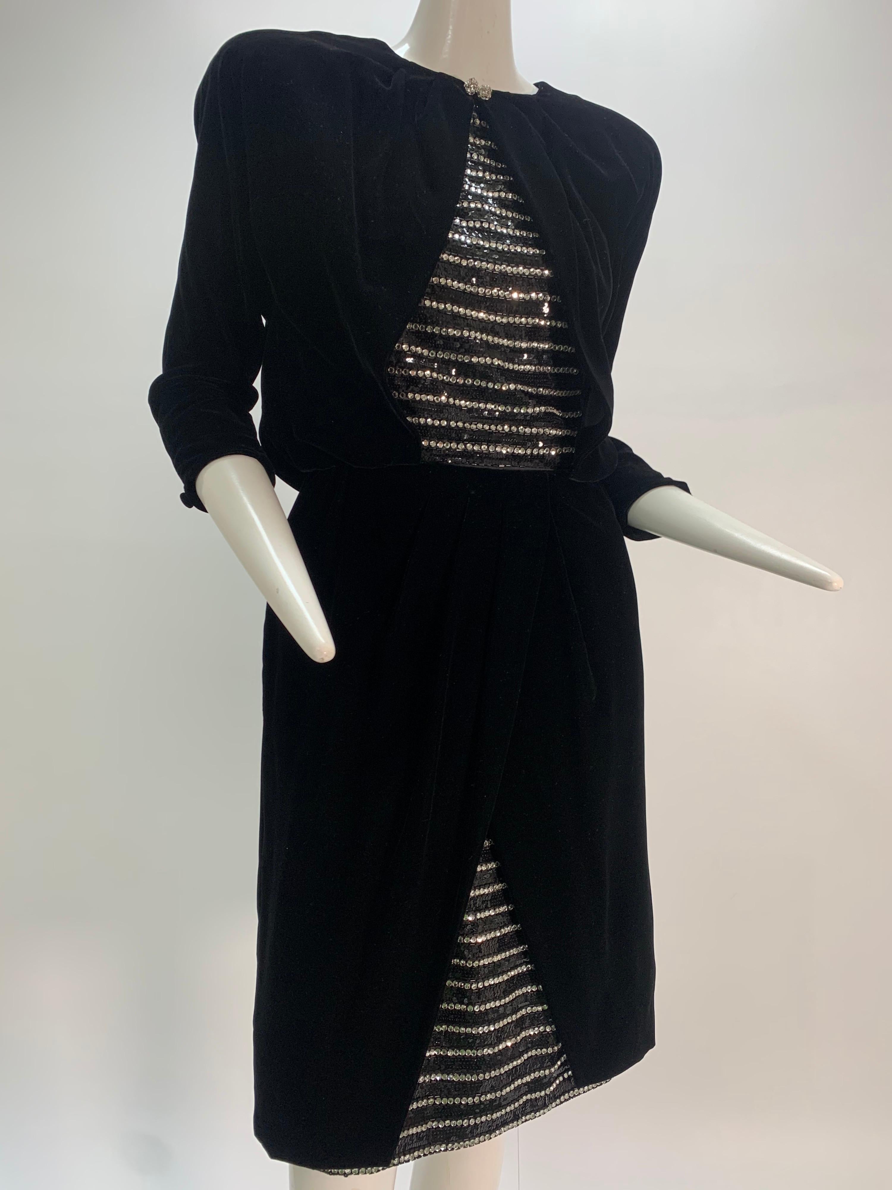 A 1980s Carolyne Roehm black velvet 1940s-inspired cocktail dress: Has the appearance of a suit with exposed panels of rhinestone and sequin striped silk. Structured shoulders and beautifully constructed. 