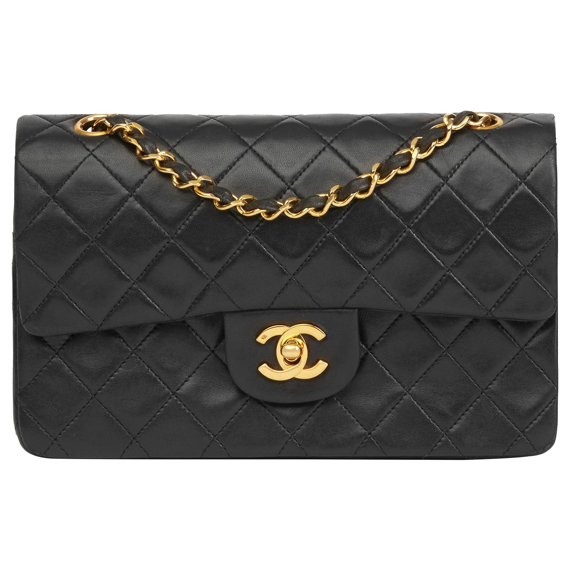 CHANEL Black Quilted Lambskin Vintage Medium Leather Logo Flap Bag at  1stDibs  original chanel 10218184 price, chanel 10218184 black, chanel  handbag 10218184