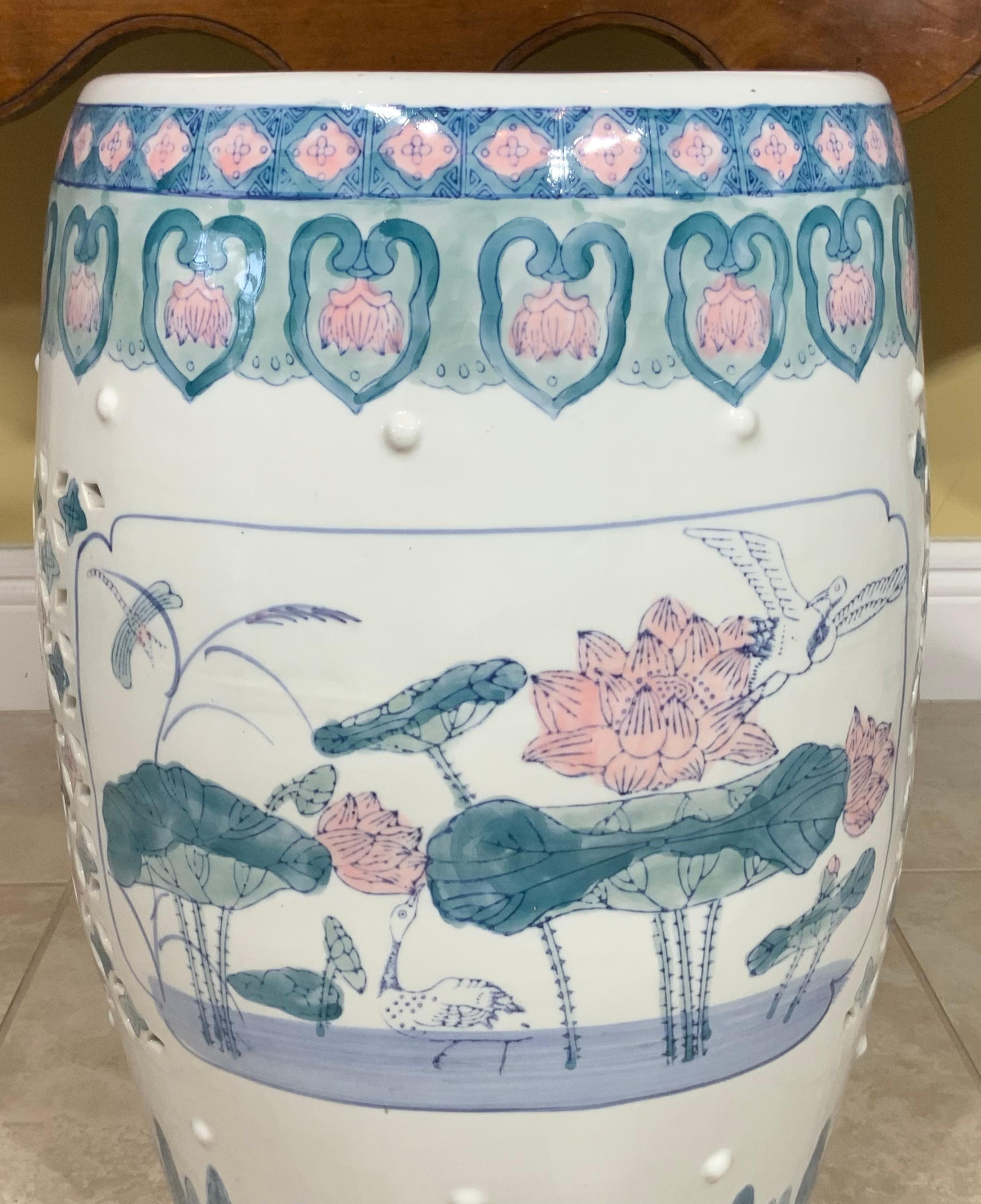 Beautiful garden stool made of ceramic, of Garden scenery with Lotus flowers . Nice border on the top and bottom and soft colors of blue ,green and pink . Could use in outdoor garden or indoor as small side table.
Exceptional object of art for