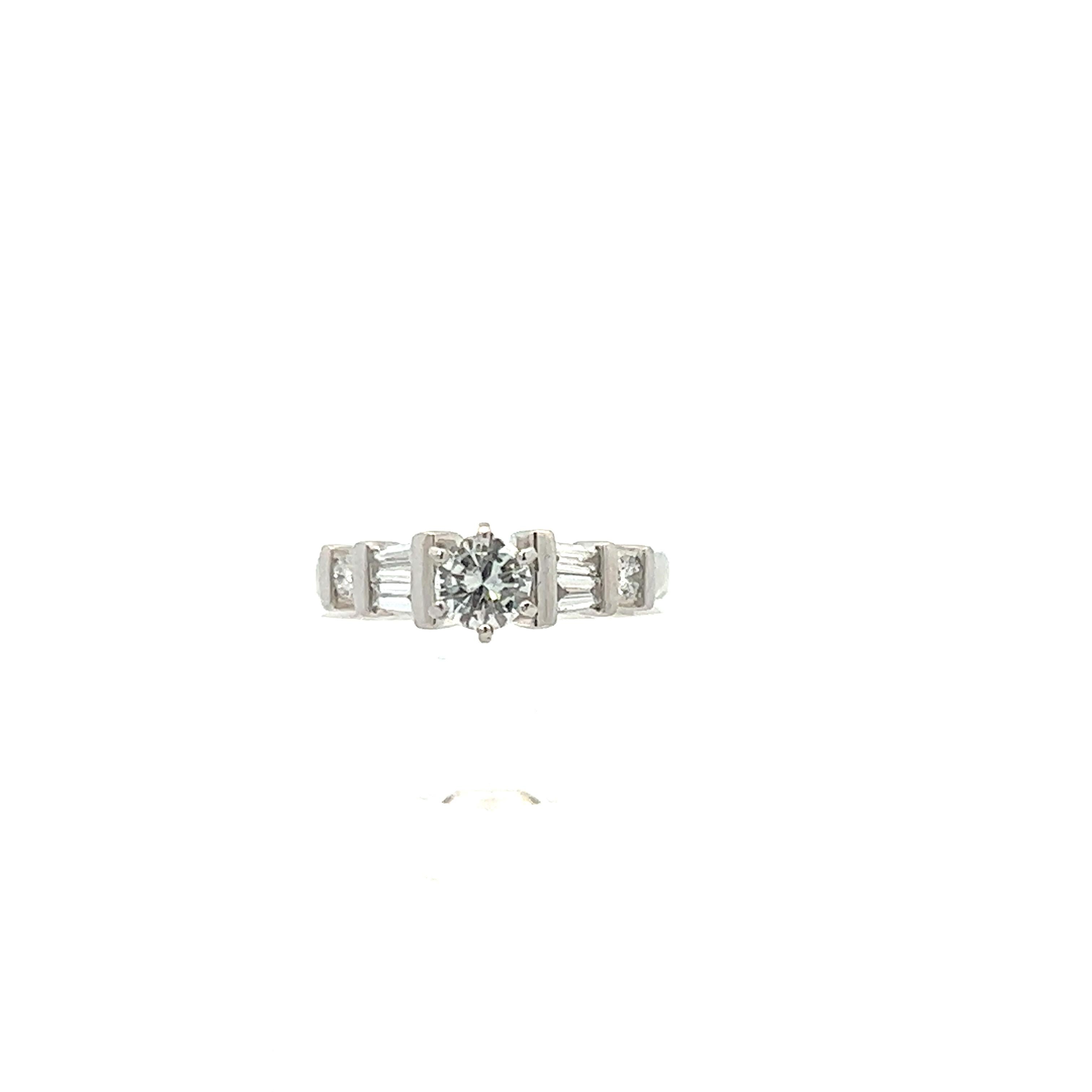1980 Contemporary Platinum Round/Baguette Diamond Ring  For Sale 1