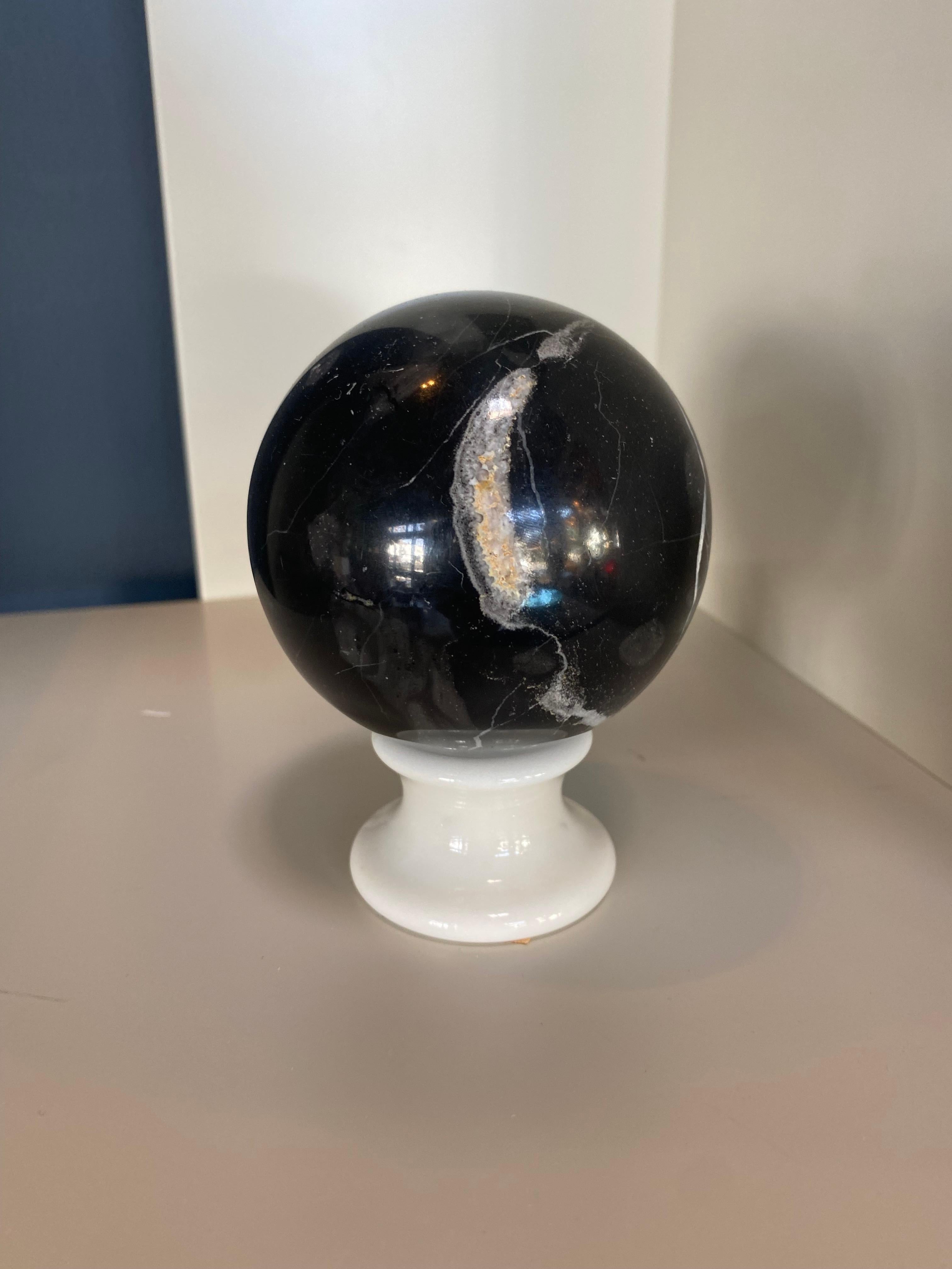 Beautiful Italian marble sphere with withe stand.
   