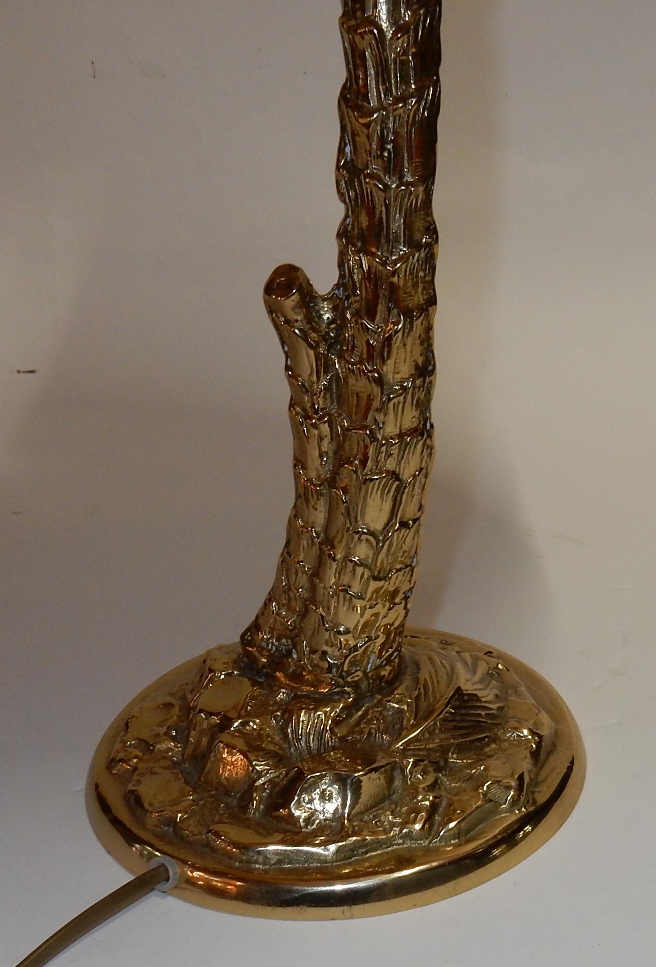 Gilt bronze lamp with palm tree and acrobatic monkeys, circa 1980, Good condition.
The height is taken from the base to the socket without the bulb.




 