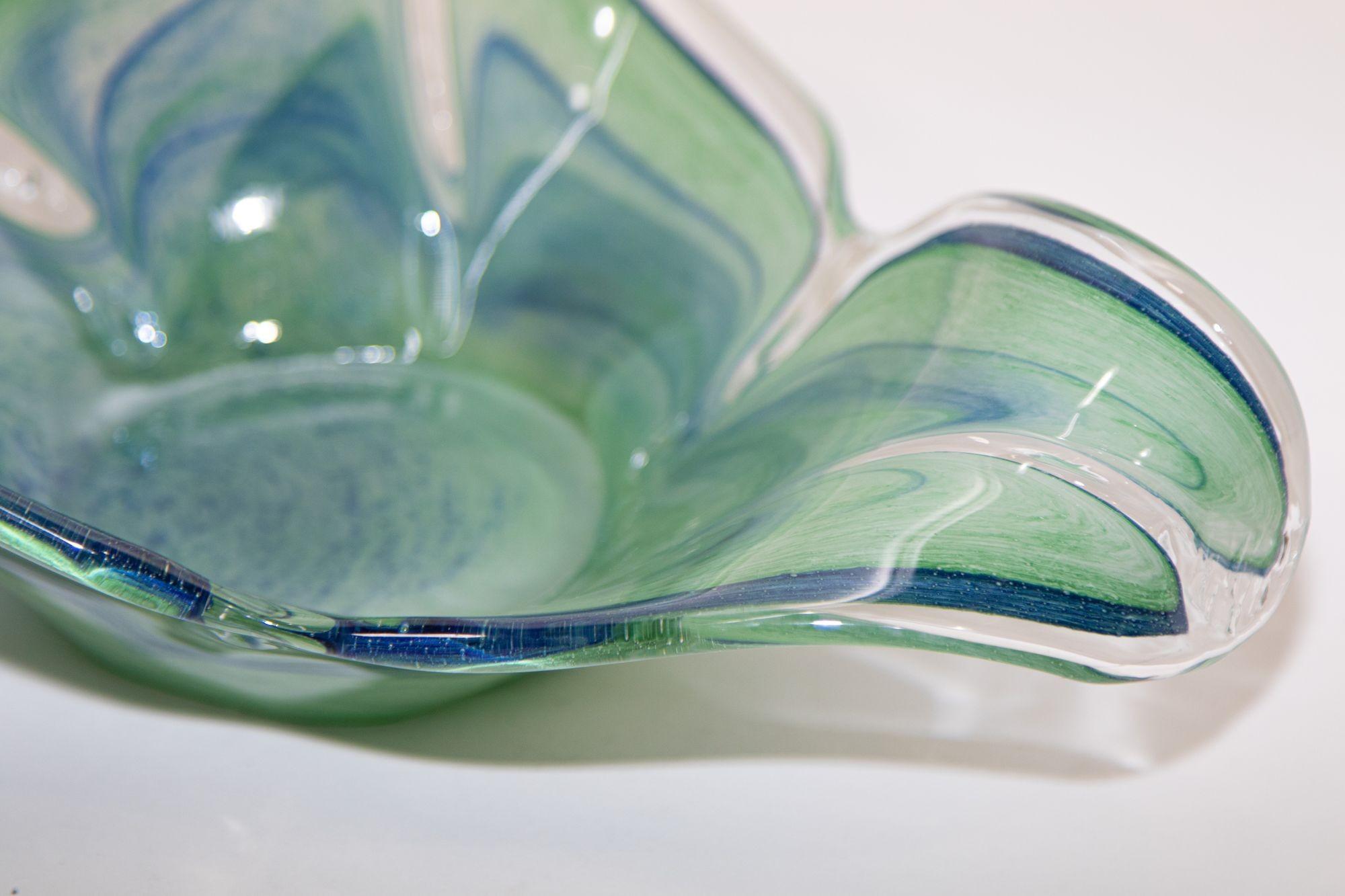 Large Murano art glass blue, green, teal decorative bowl in the shape of a three petals flower.
Great size, use it as a decorative Bowl, candleholder, Candy Dish.
Very unusual design free form hand blown bowl.
Hand crafted Murano blown glass,