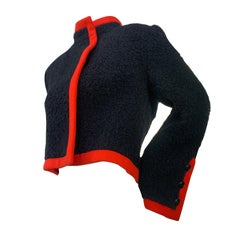 James Galanos - Veste en laine bouclée noire avec passepoil en maille orange, 1980