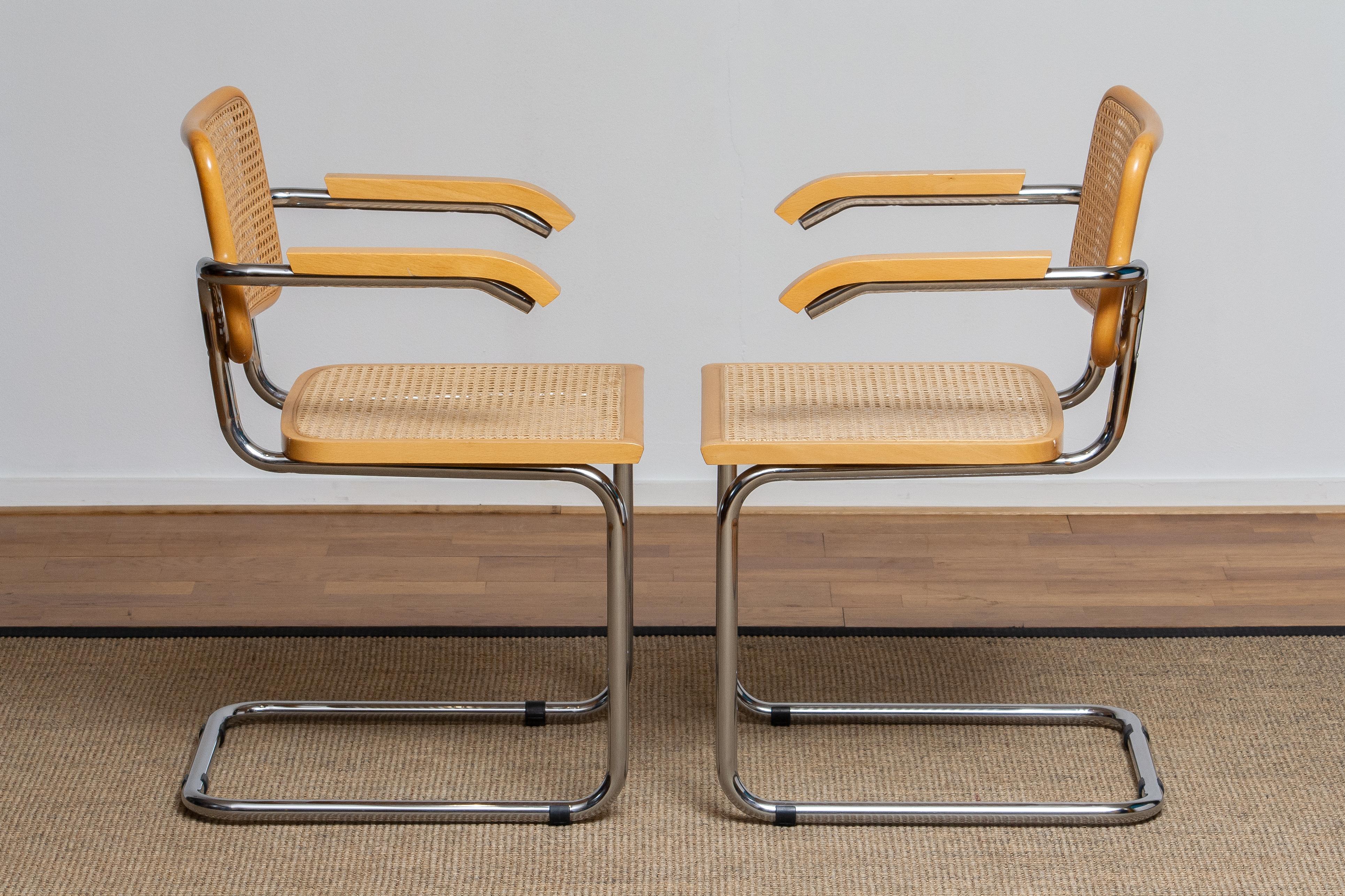 Beautiful set of two dining chairs model Cesca B64. Chromed tubular steel frames and beechwood with Viennese natural grid.
Both in good condition.
 