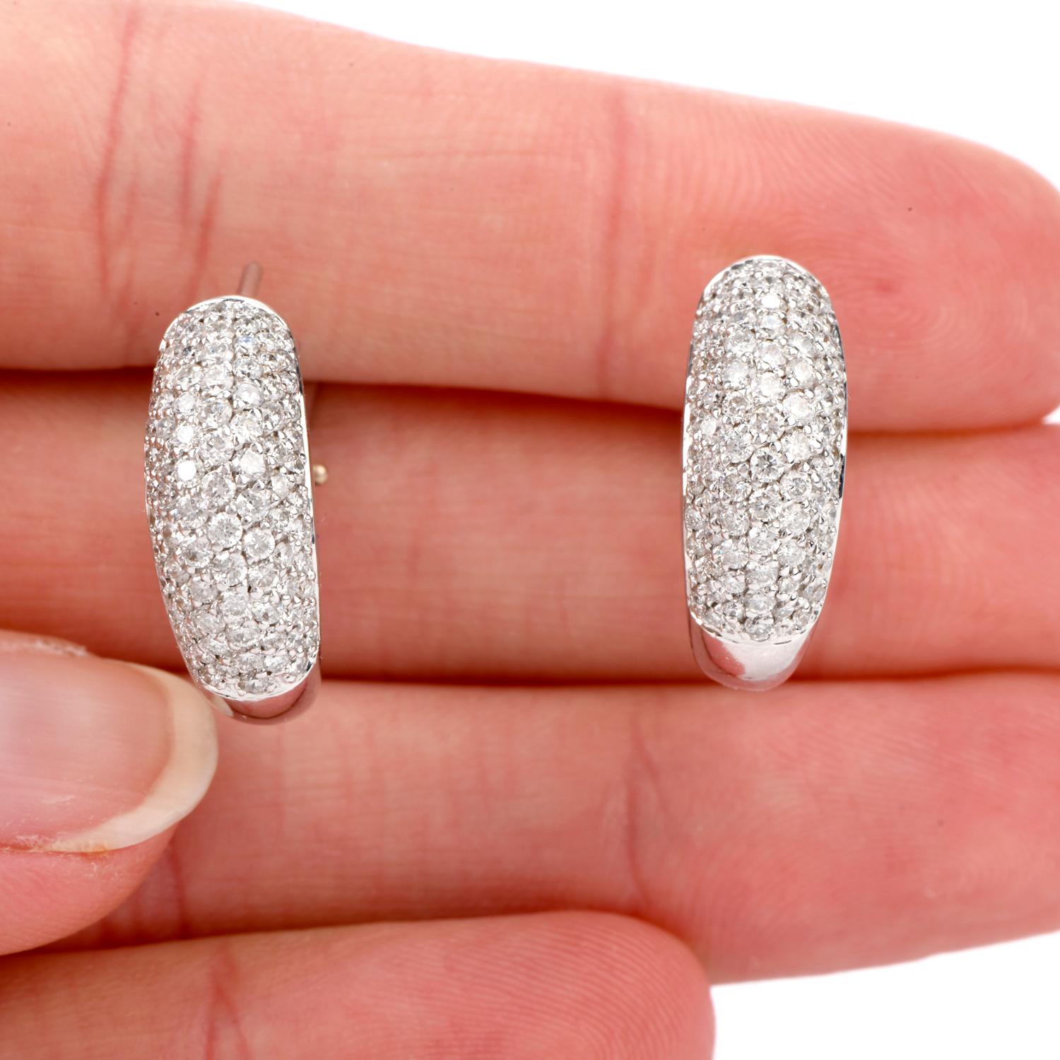 These beautiful Pave Diamond Earrings were inspired in a Domed Hoop motif and crafted in 18 Karat white Gold.

Over 150 bright white round brilliant cut diamonds adorn these earrings weighing approx. 1.85 carat and are of G-H color and ranging from