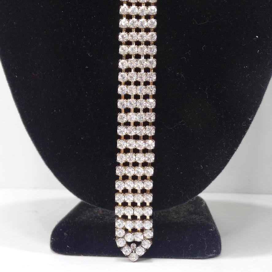 Everybody needs a bling tie in their jewelry collection! This 1980s rhinestone chain motif necklace is soo eye catching and special! Stunning rhinestone choker with the most unique tie motif made fully of rhinestones! This piece is soo fun to play