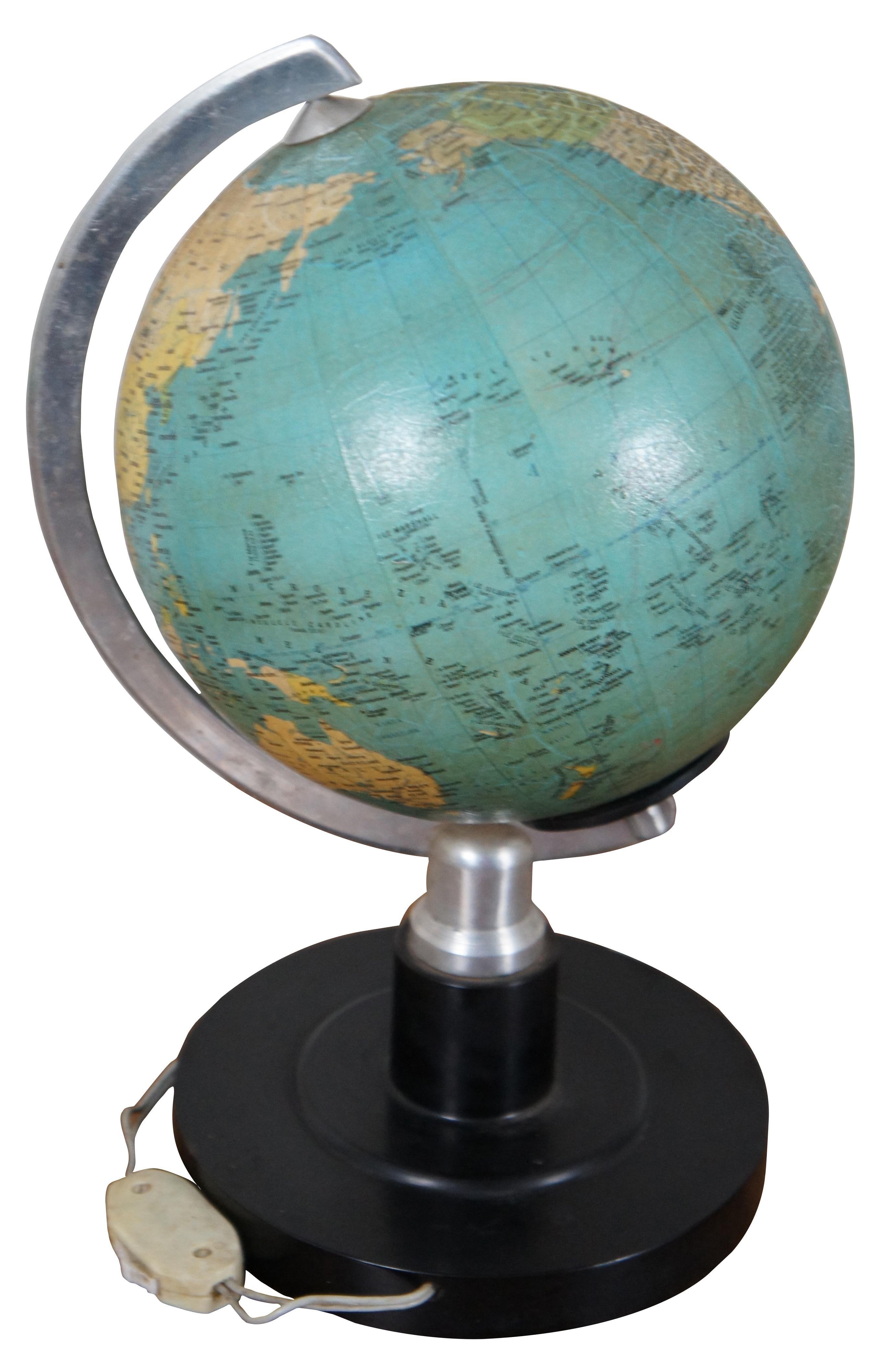 Illuminated 1980 / II Globul Geografic Politic (The Political Geographic Globe) published by the Intreprinderea Poligrafica (Polygraphic Company) of Brasov, Romania. Comprised of paper overlaid on a glass globe, mounted on a metal and plastic base.