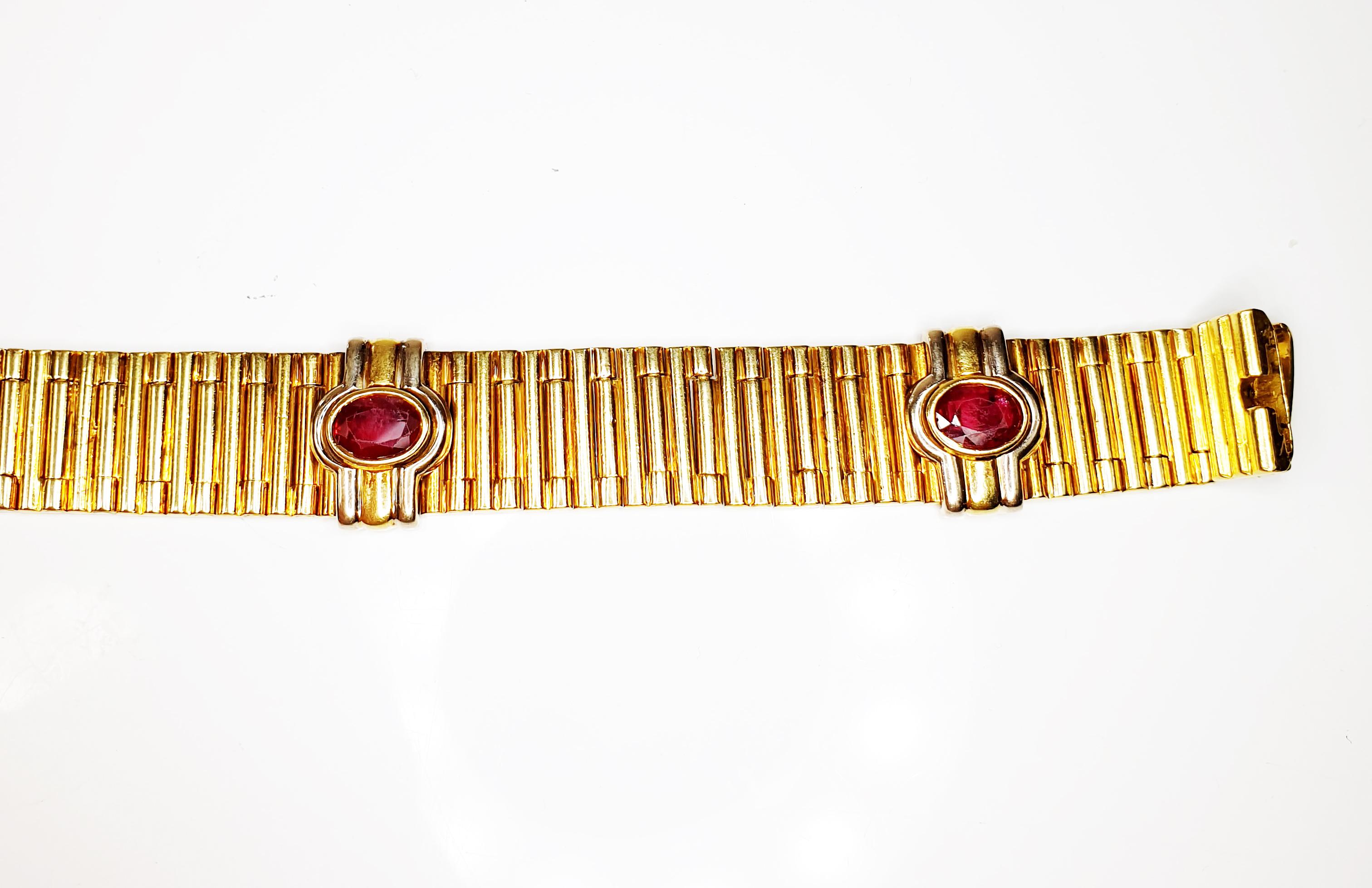 Oval Cut 1980s Bracelet Manchette Bullet Rouleaux 18 Karat Yellow Gold and Oval Rubies