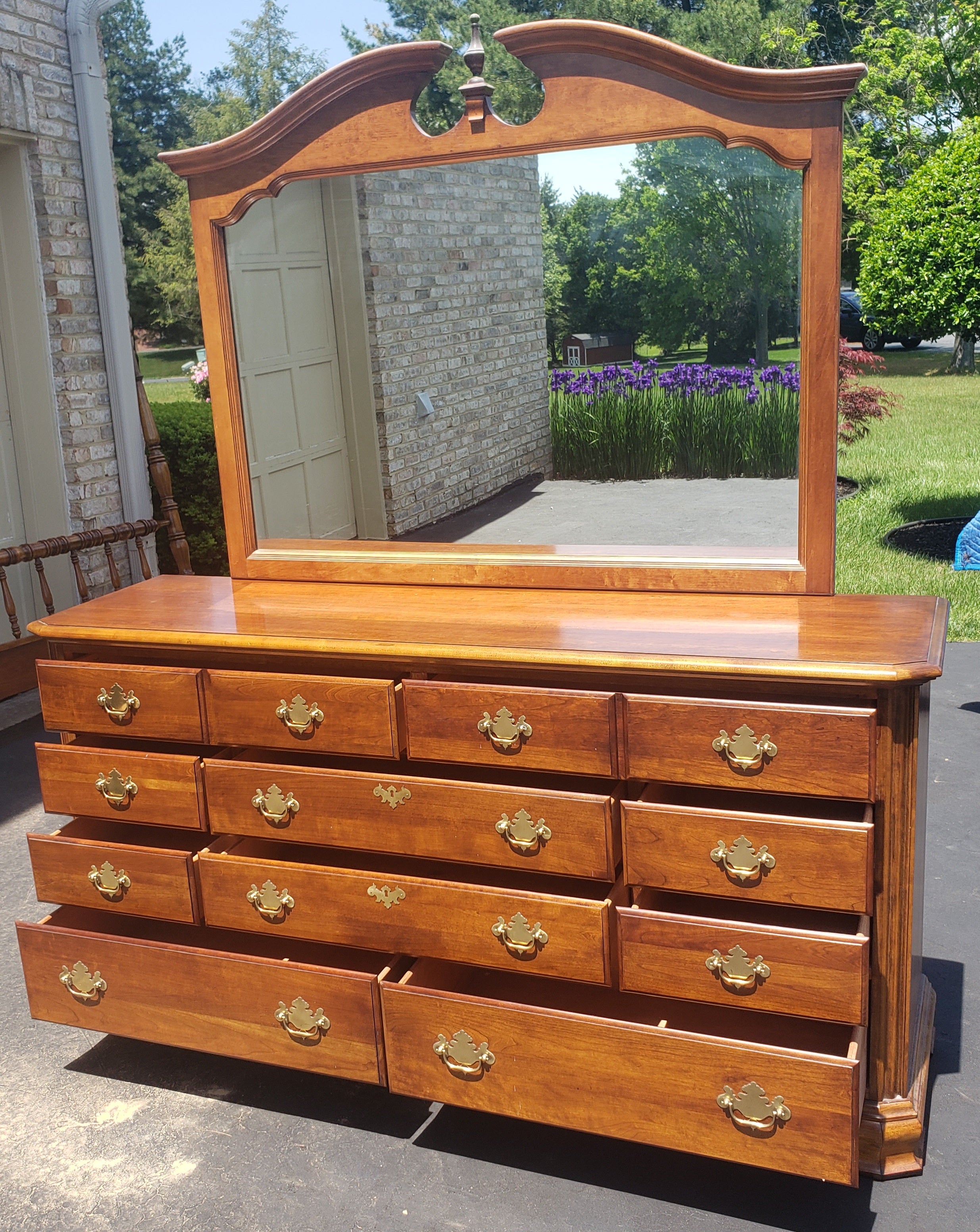 Stanley Furniture American Craftman Collection Chippendale Cherry dresser with mirror.
Very good vintage condition. Solid cherry with smoothly operating dovetailed drawers.
Mirror measures 41