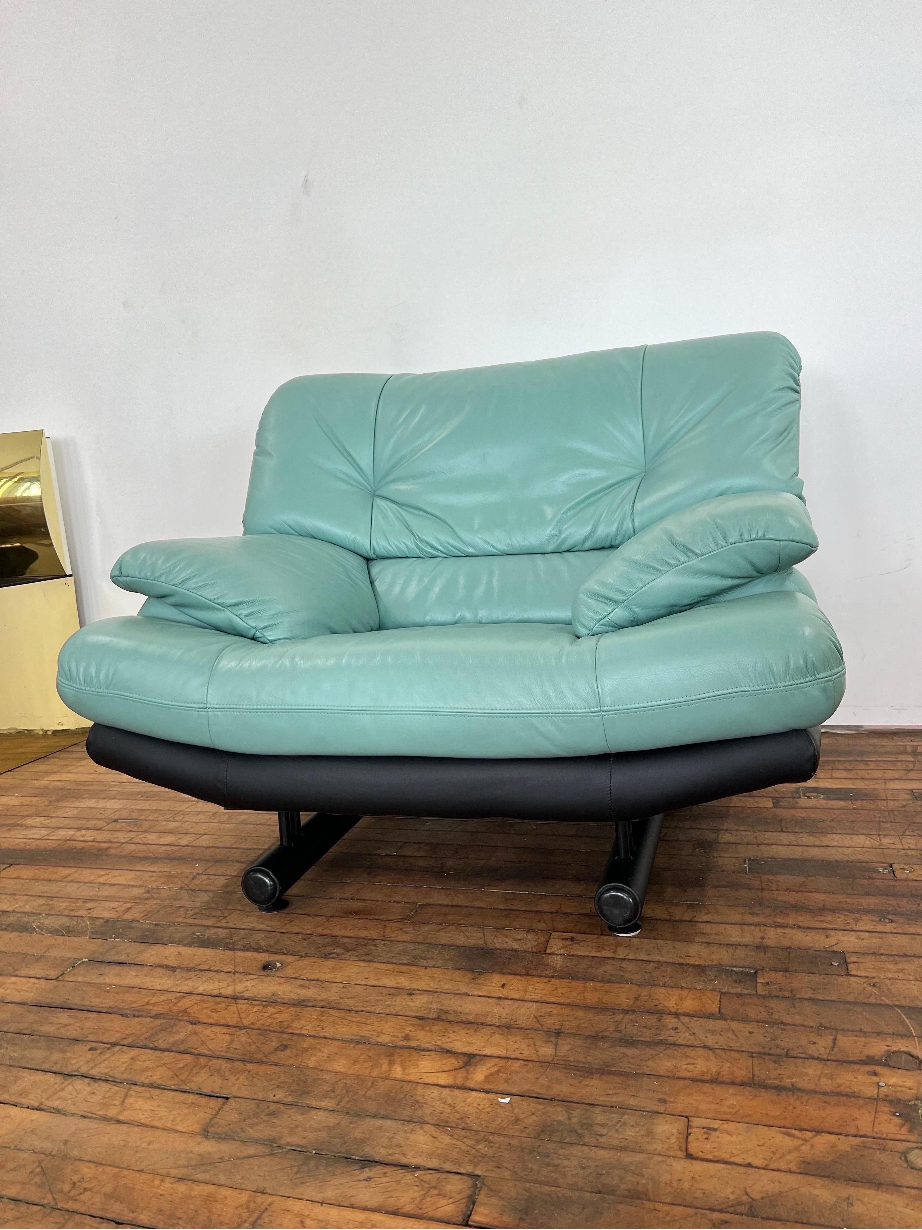 1980 Turquoise Leather Chair Natuzzi Style, Made in Italy

There are matching loveseats and 3 seaters  sofa available in two separate listings. All of them are in excellent vintage condition.