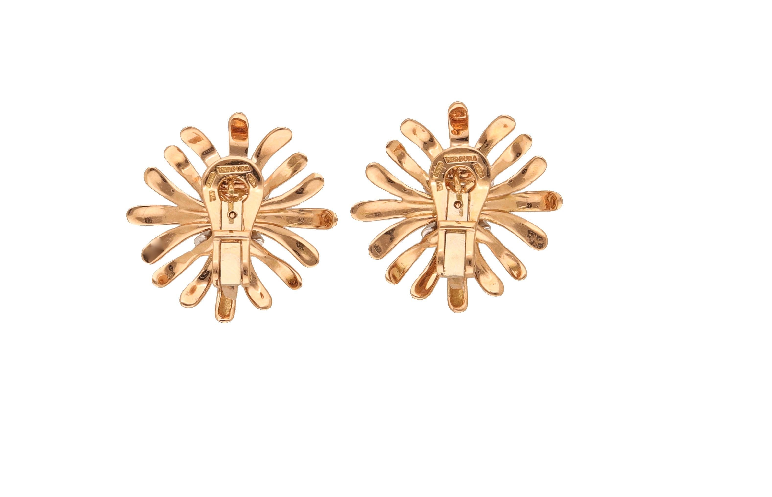 18 karat yellow and white gold clip-on earrings with round-cut diamonds signed by Verdura.
These classic pair of earrings can be worn every day.
Verdura is an Italian jewelry designer known for his original and eccentric style.

Weight: 17.00