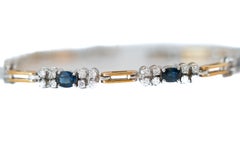 1980s 0.75 Carat Diamond and 1 Carat Sapphire Link Bracelet in 18 Karat Gold