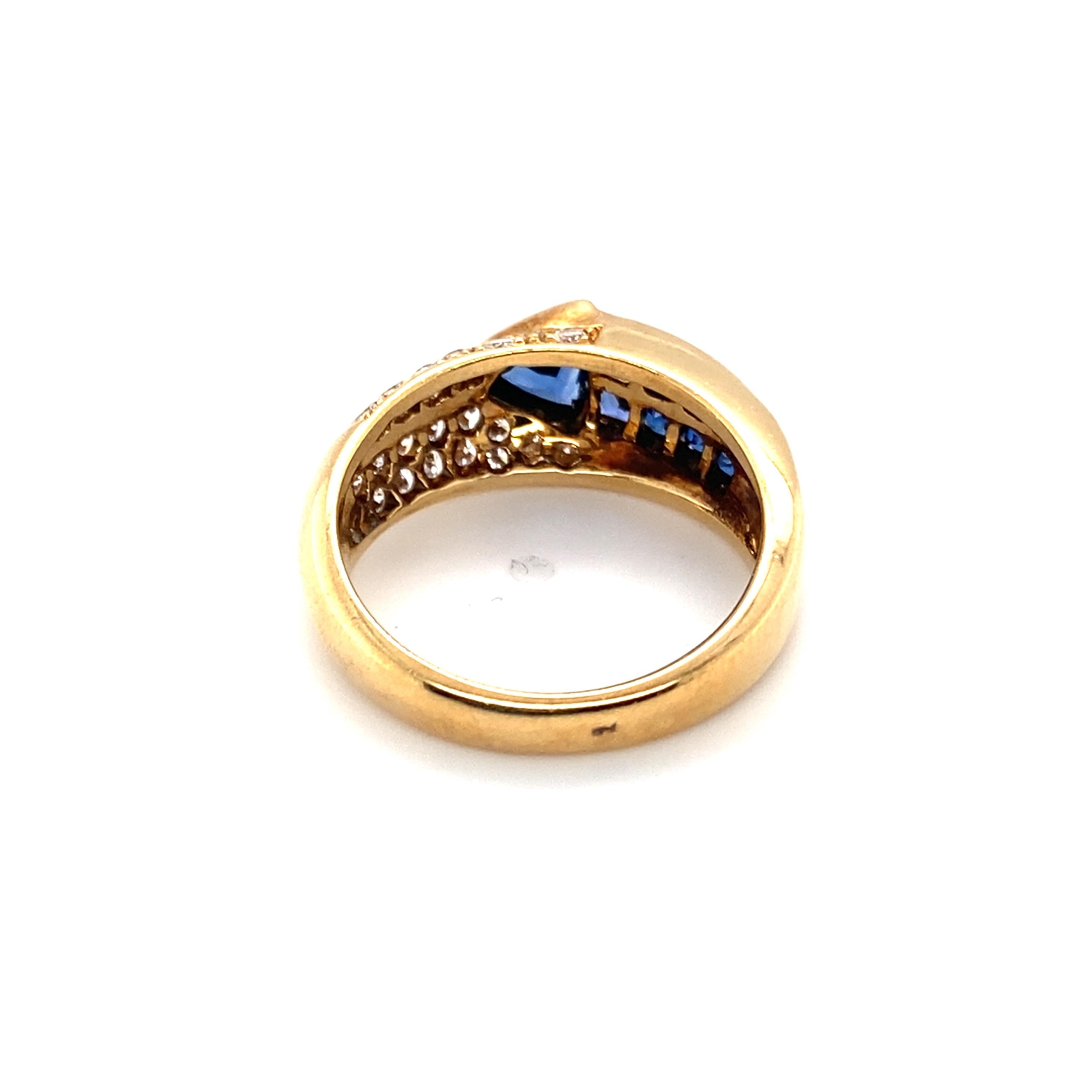 Retro 1980s 0.75 Carat Sapphire and 0.50 Carat Diamond Ring in 18 Karat Yellow Gold  For Sale