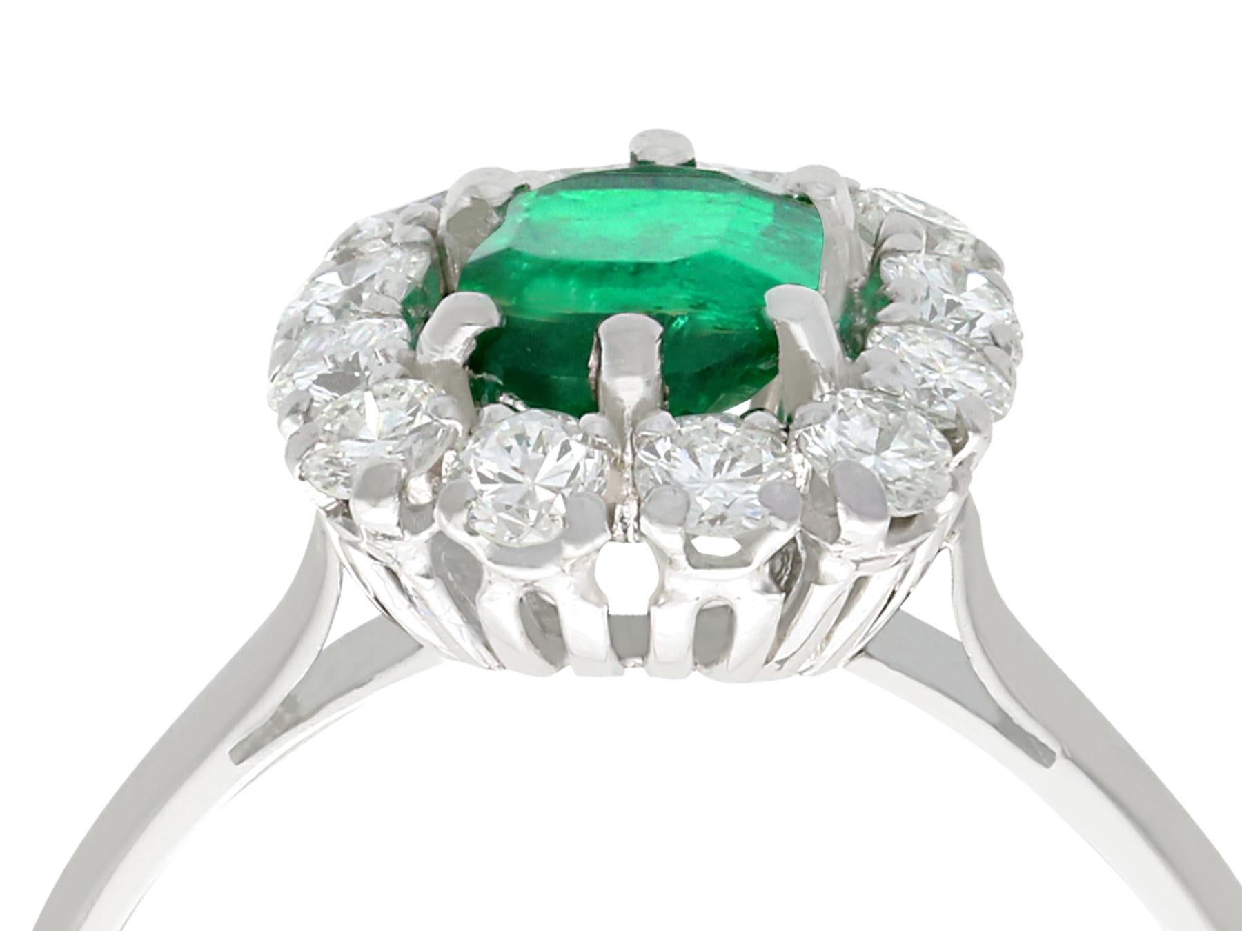 A fine and impressive 1.33 carat natural emerald and 0.90 carat diamond, 18 karat white gold vintage cocktail ring; an addition to our vintage estate jewelry collections.

This impressive vintage cocktail ring has been crafted in 18 karat white