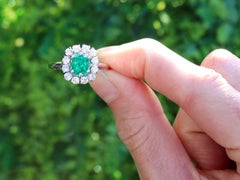 1980s 1.33 Carat Emerald and Diamond Gold Cluster Ring