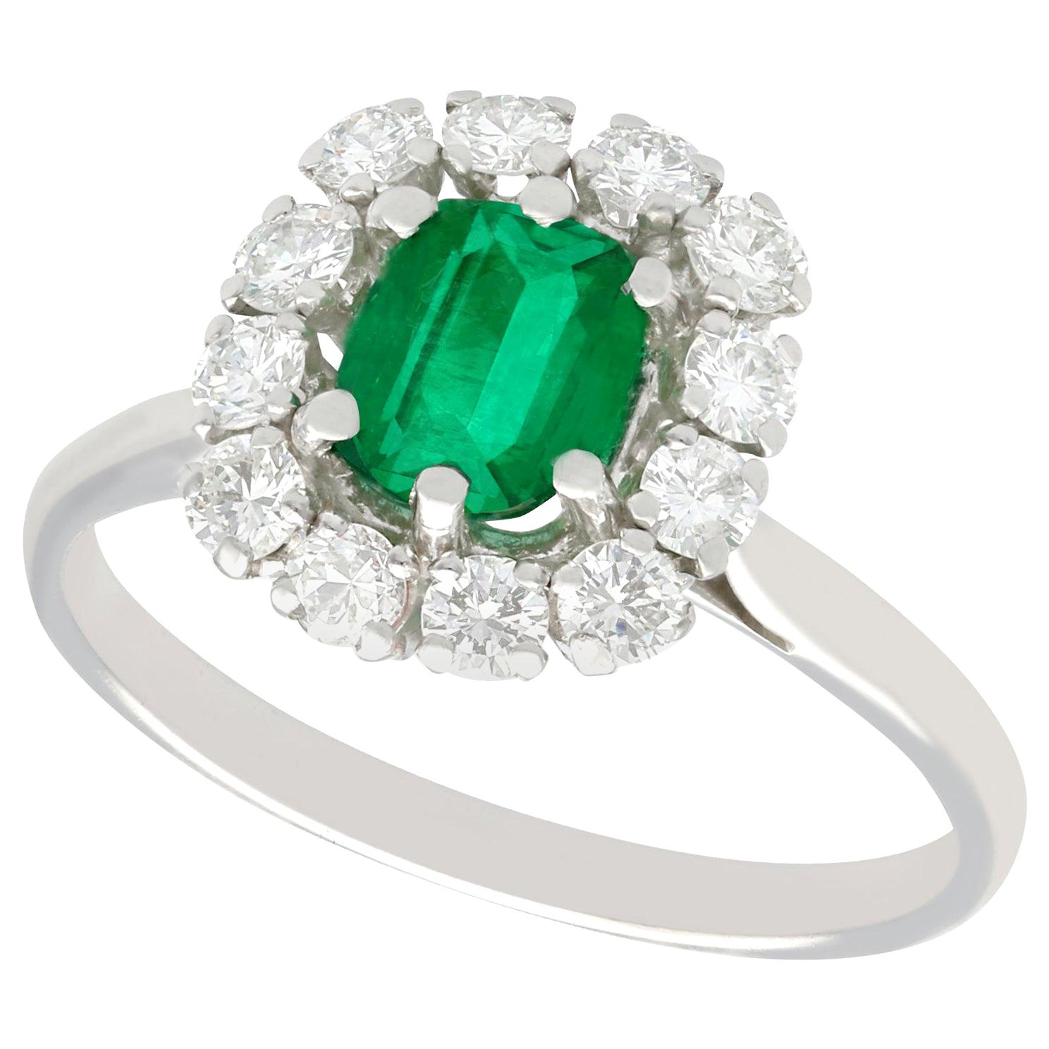 1980s 1.33 Carat Emerald and Diamond Gold Cluster Ring For Sale
