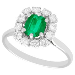 1980s 1.33 Carat Emerald and Diamond Gold Cluster Ring