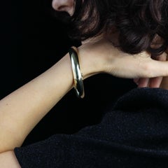 1980s 14 Karat Yellow Gold Oval Domed Bangle Bracelet