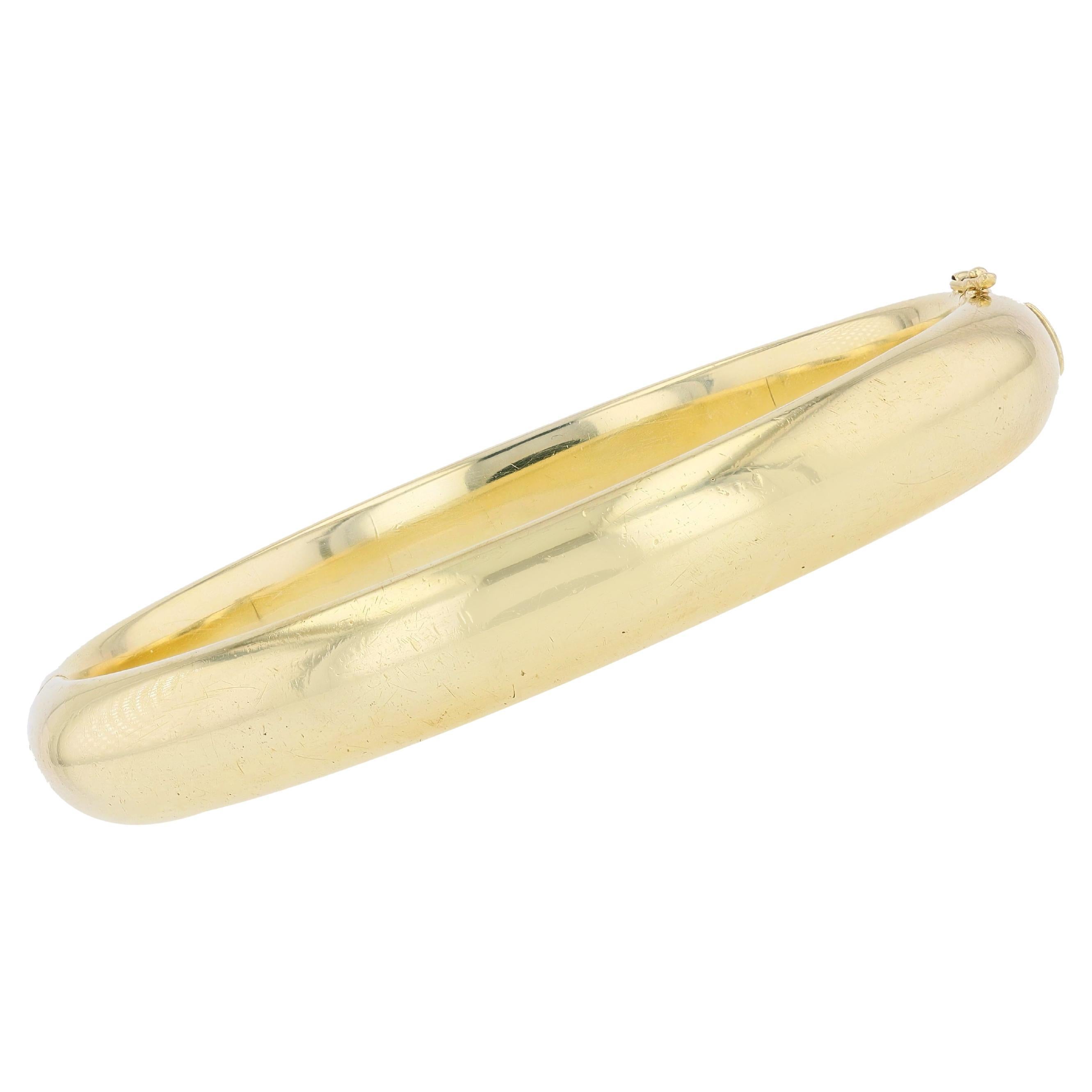1980s 14 Karat Yellow Gold Oval Domed Bangle Bracelet For Sale