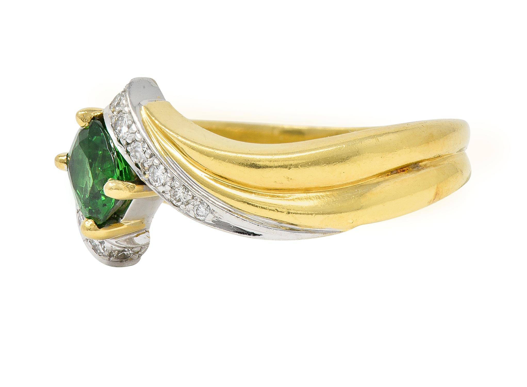 Women's or Men's 1980s 1.65 CTW Tsavorite Garnet Diamond 18 Karat Two-Tone Gold Bypass Ring For Sale