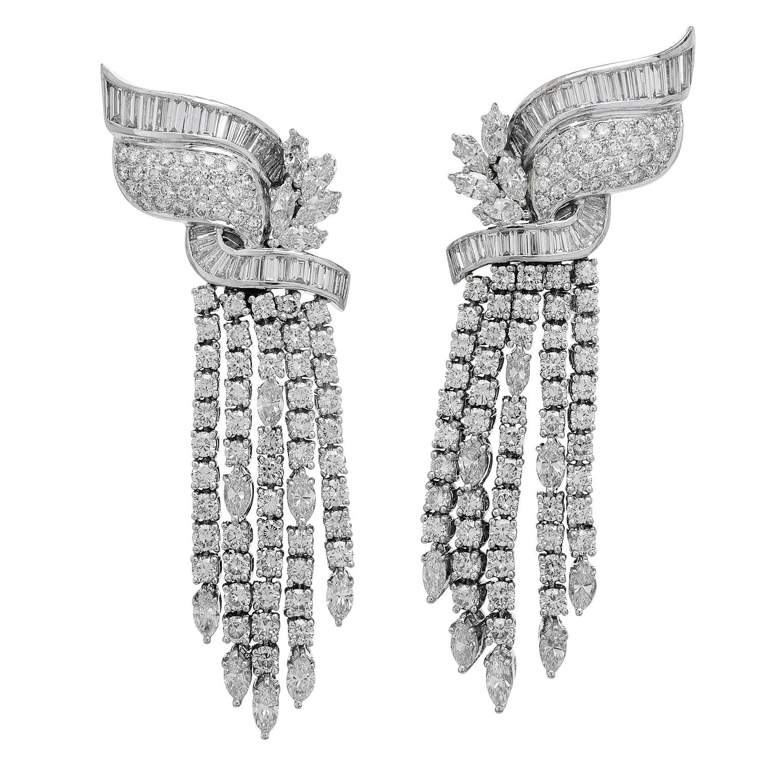 These striking Diamond Vintage Deco Style earrings are

crafted in Luxiousirous 18K White Gold.

This pair of earrings boasts sparkle and movement as each earring features rows of multiple-shaped diamonds. 

The variety of diamond shapes