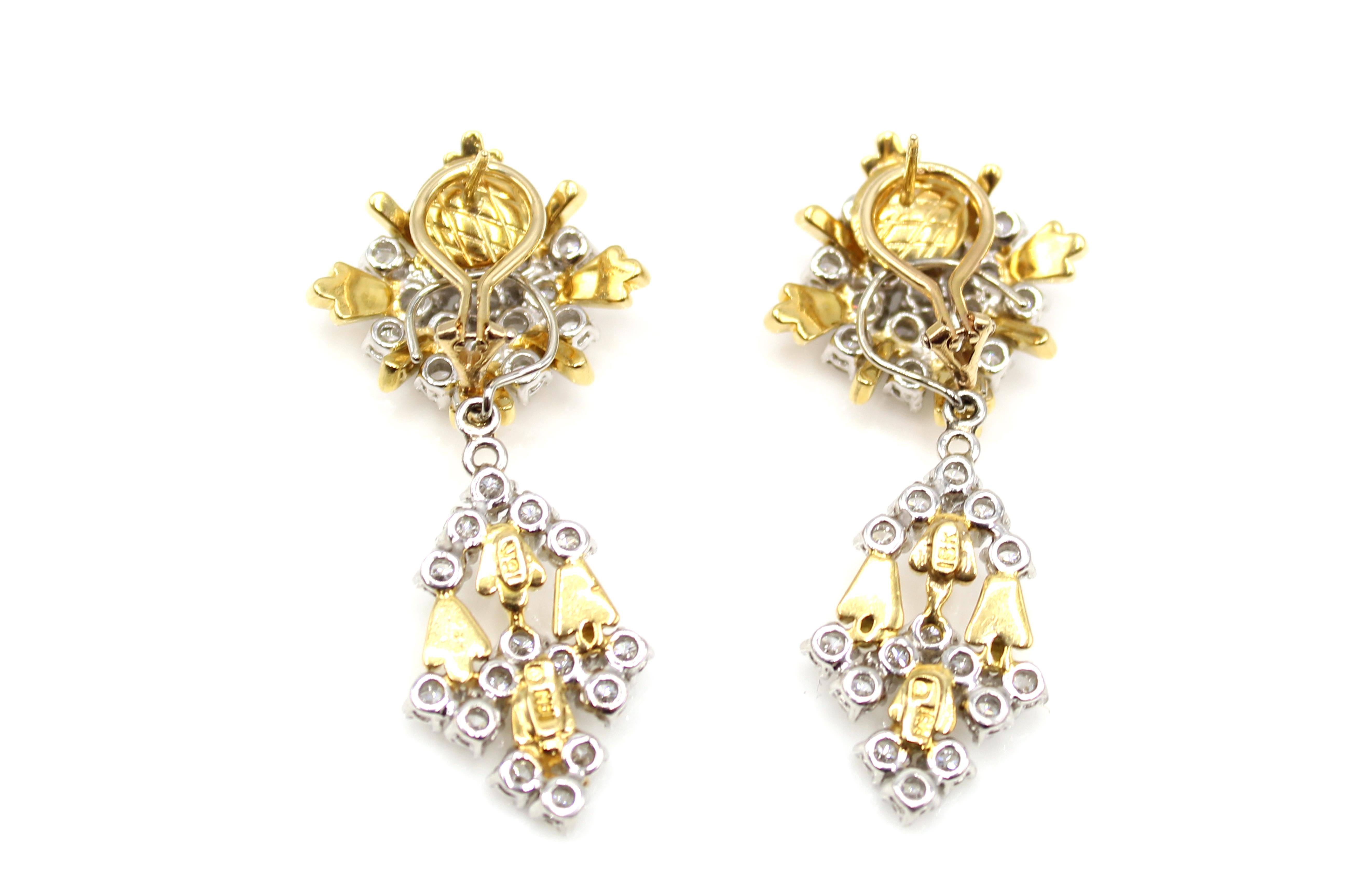 Masterfully hand-crafted in 18 karat white and yellow gold, these gorgeous 1980s stylish earrings can be worn as stunning evening ear-pendants or with the flexible bottom element detachable, as a chic pair of day-time ear clip. The tops designed as